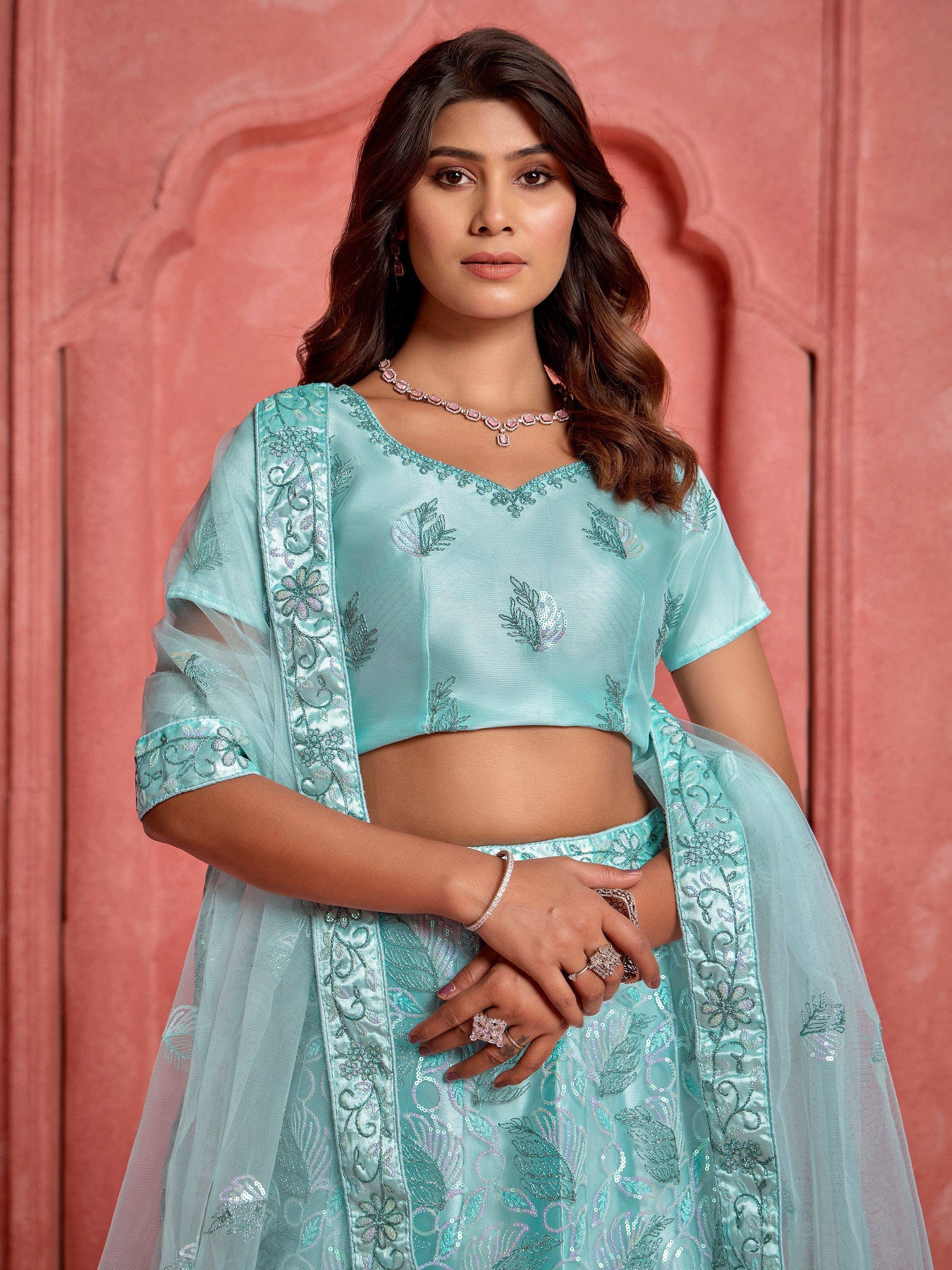 Mint green embroidered lehenga choli with sheer dupatta, perfect for Indian ethnic wear occasions