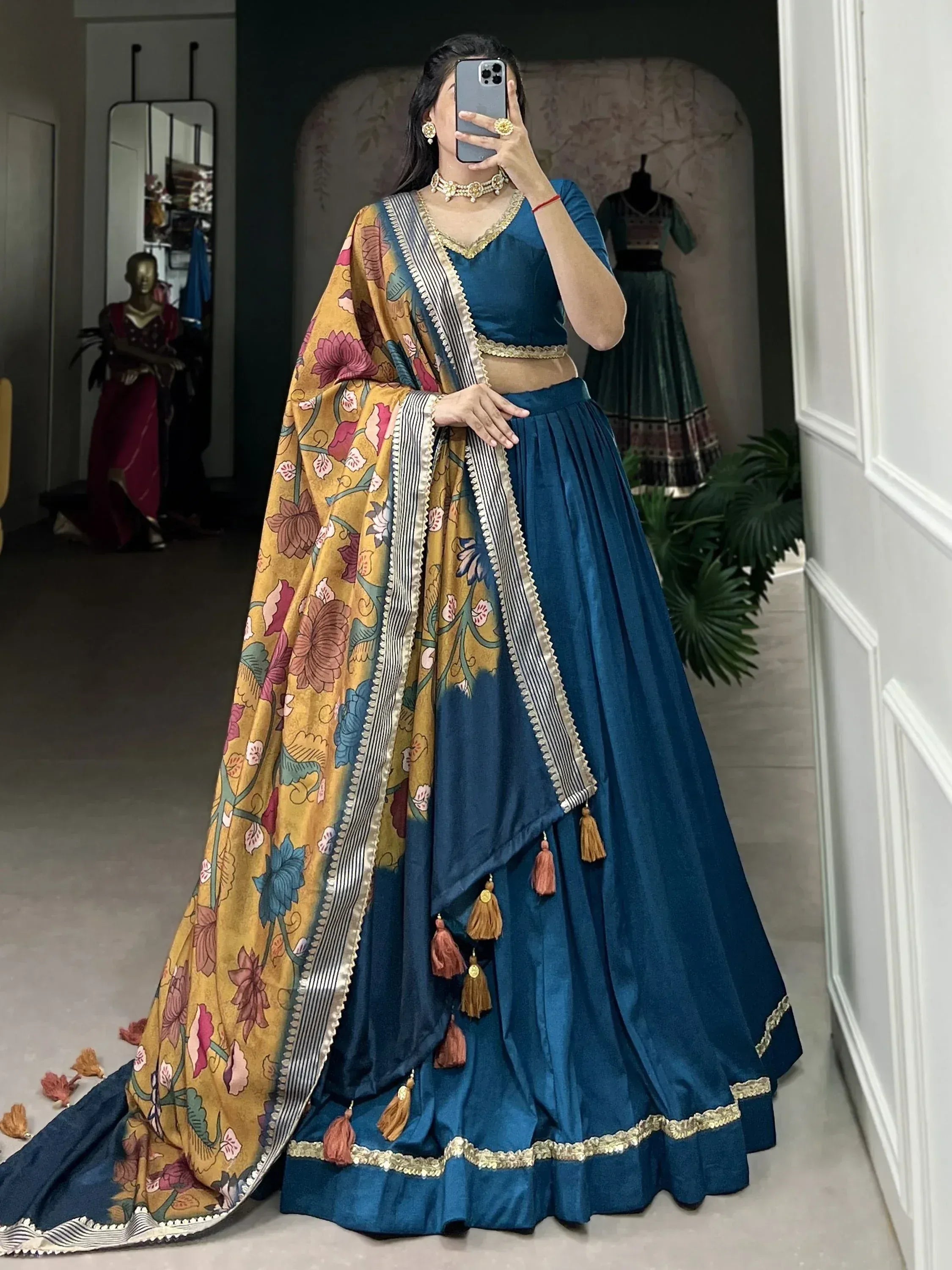 Blue velvet lehenga choli with floral dupatta, perfect for Indian ethnic wear and festive occasions