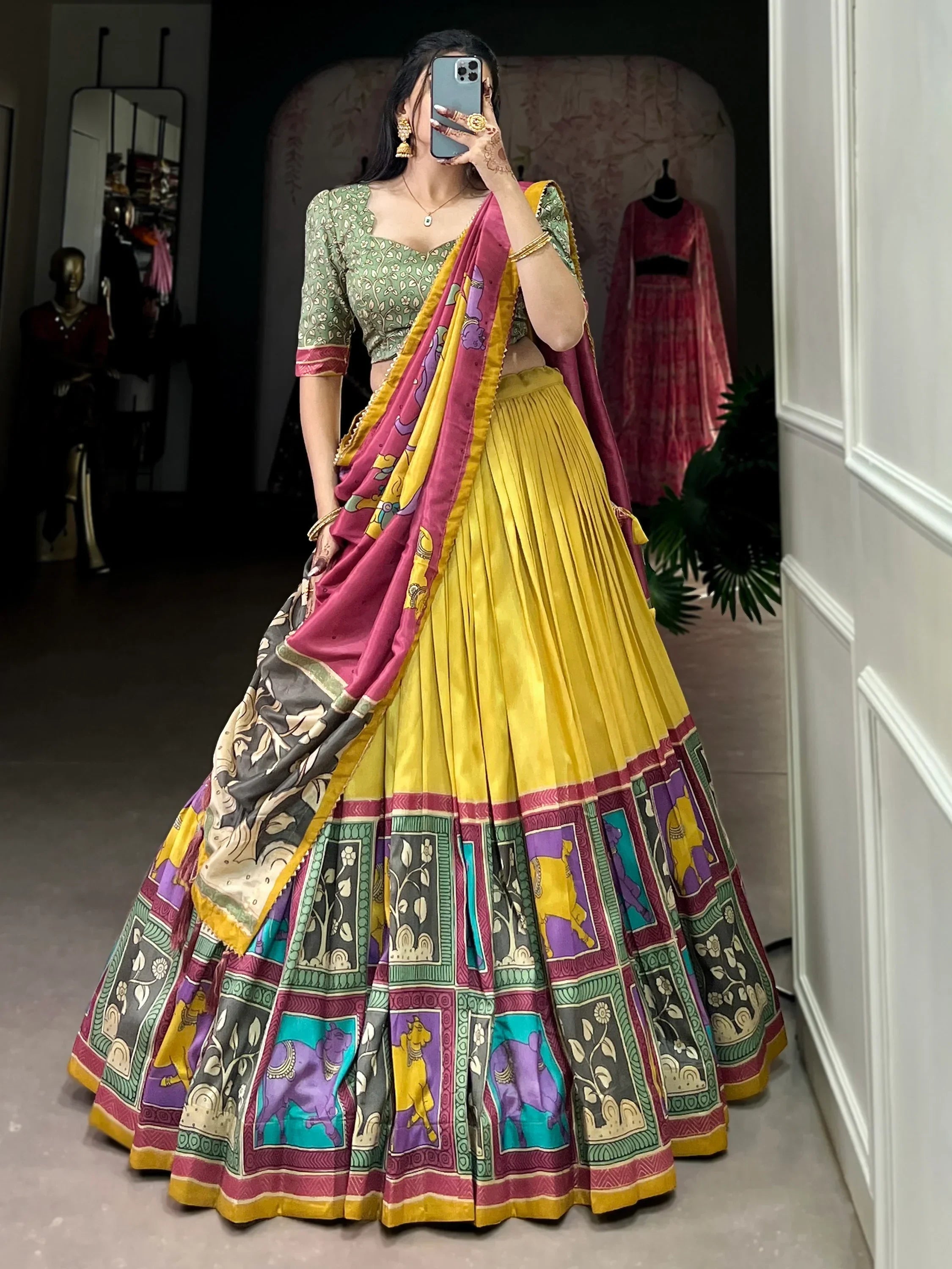 Vibrant yellow lehenga choli with printed border and matching dupatta, Indian ethnic wear