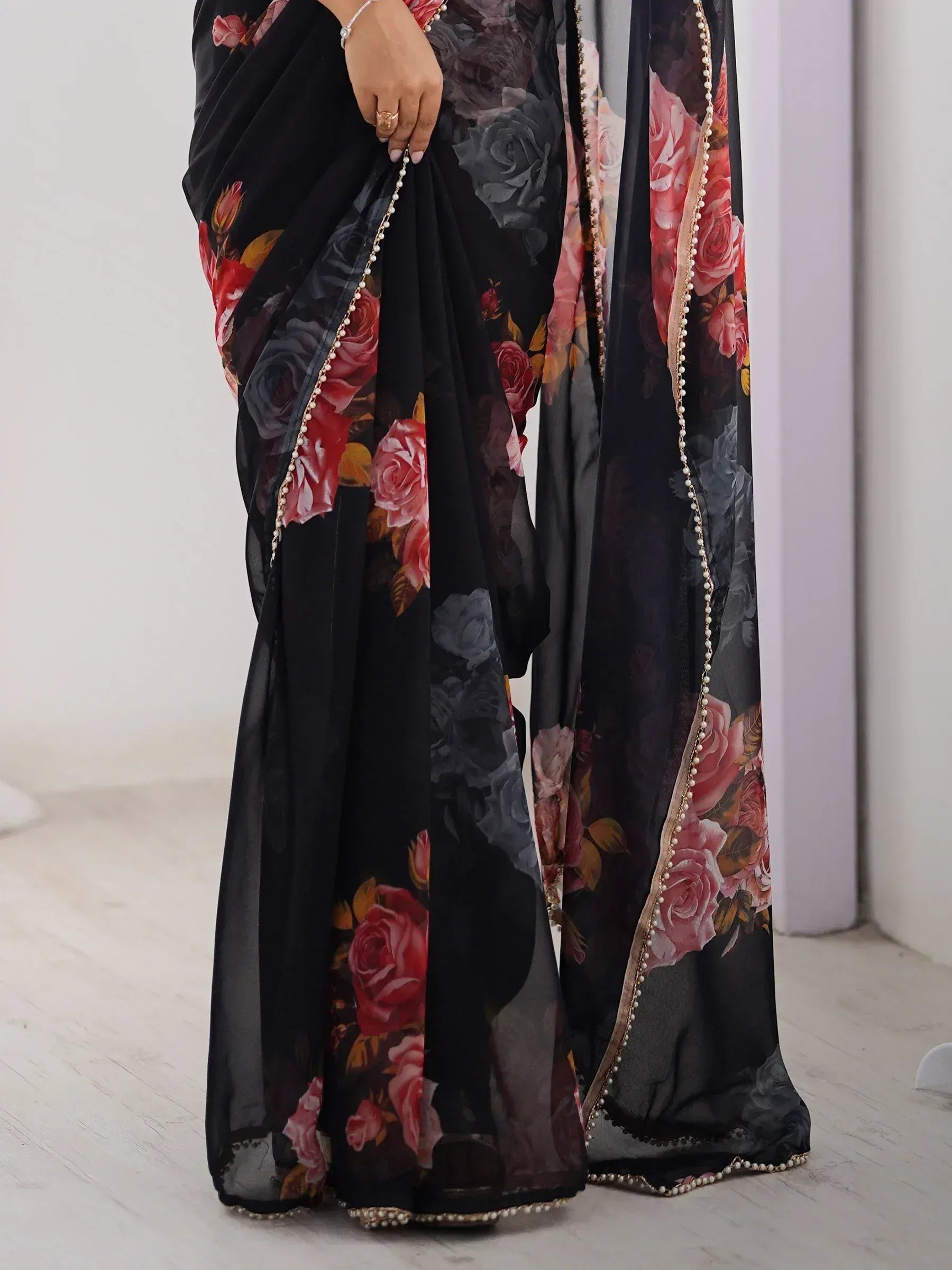 Black floral saree with rose print and pearl border, Indian ethnic wear