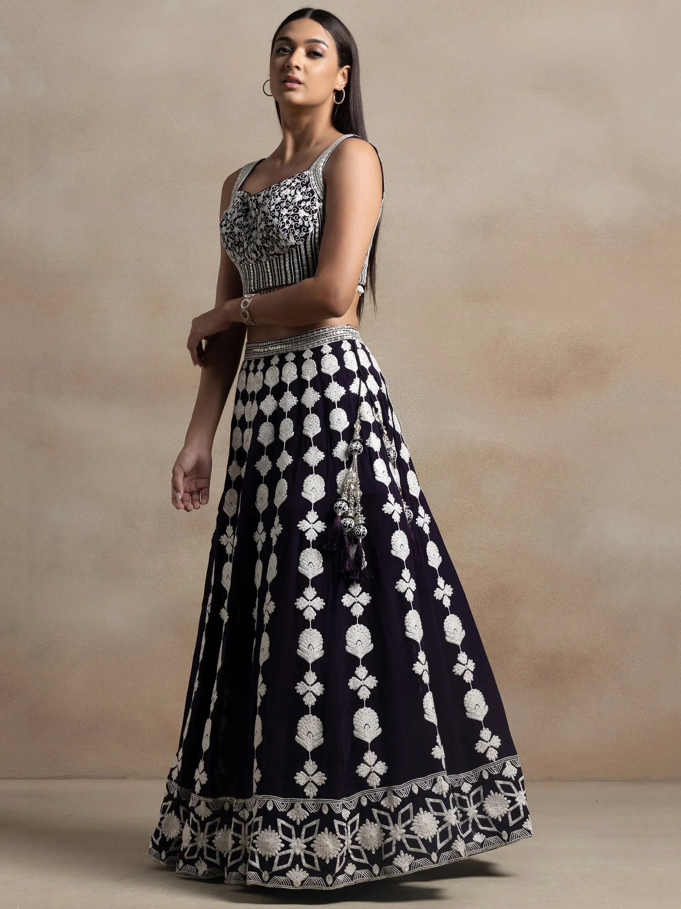 Navy blue lehenga choli with white floral embroidery and tassels, Indian ethnic wear