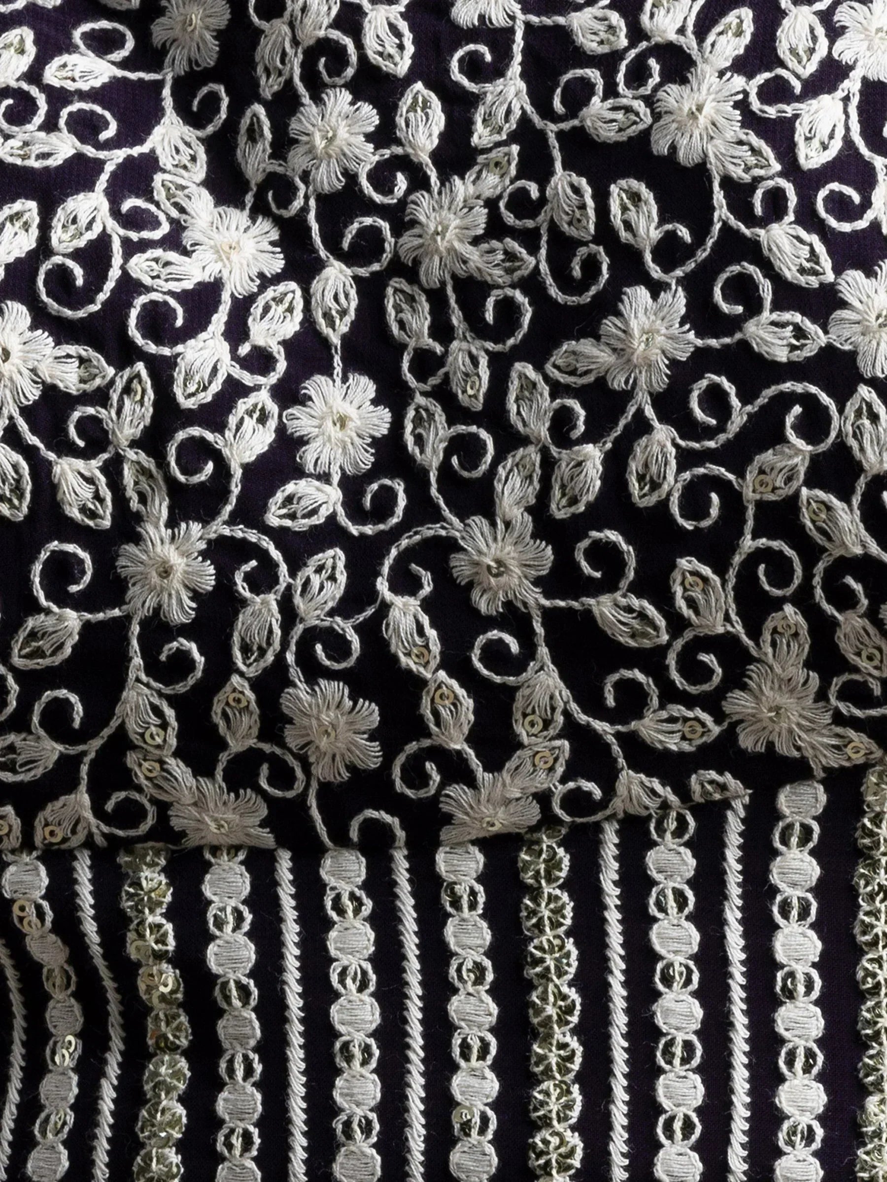 Black ethnic wear with white floral embroidery and sequin detailing for designer lehenga or saree