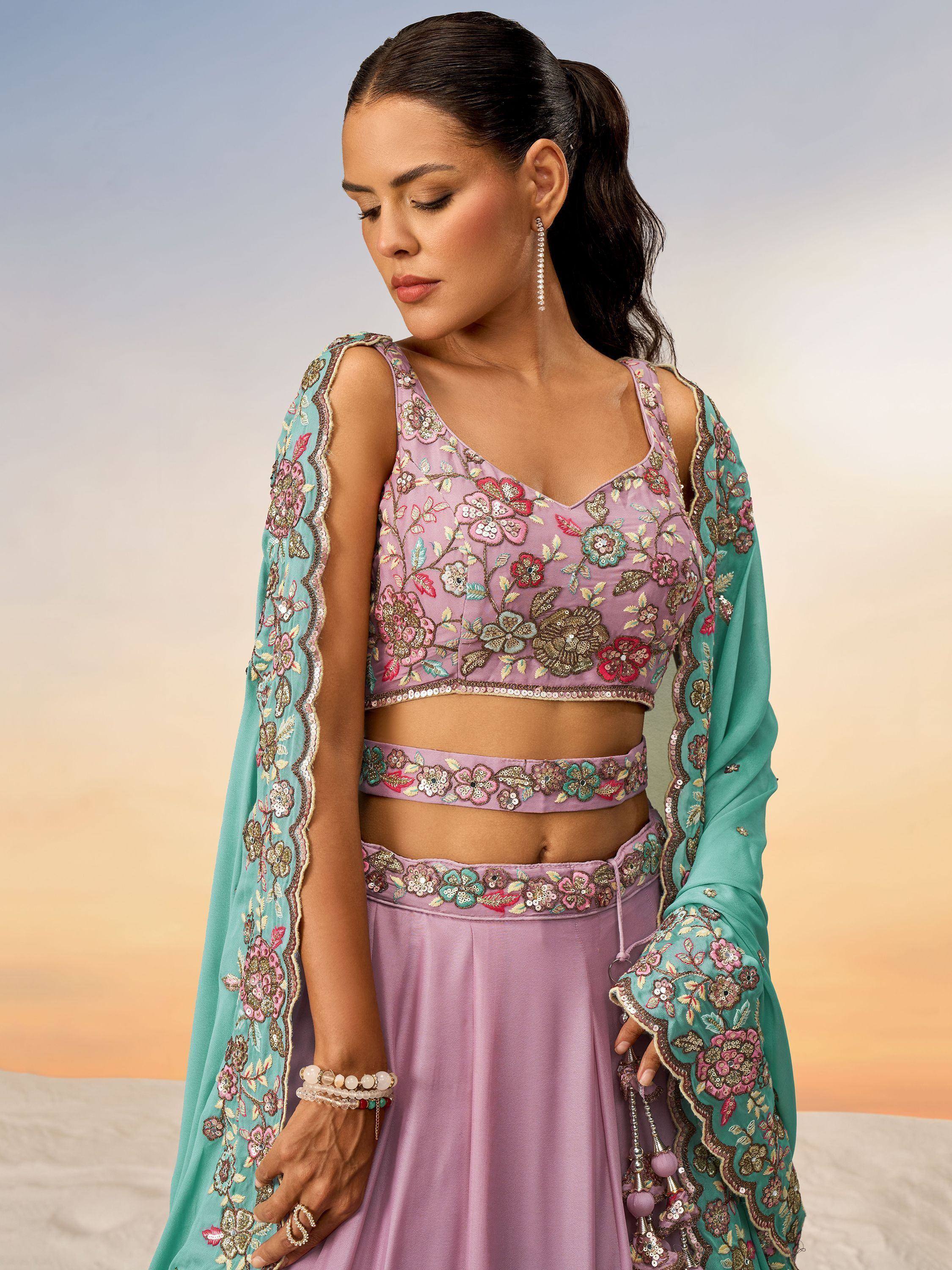 Lavender floral embroidered lehenga choli with teal dupatta, perfect for Indian ethnic wear occasions.