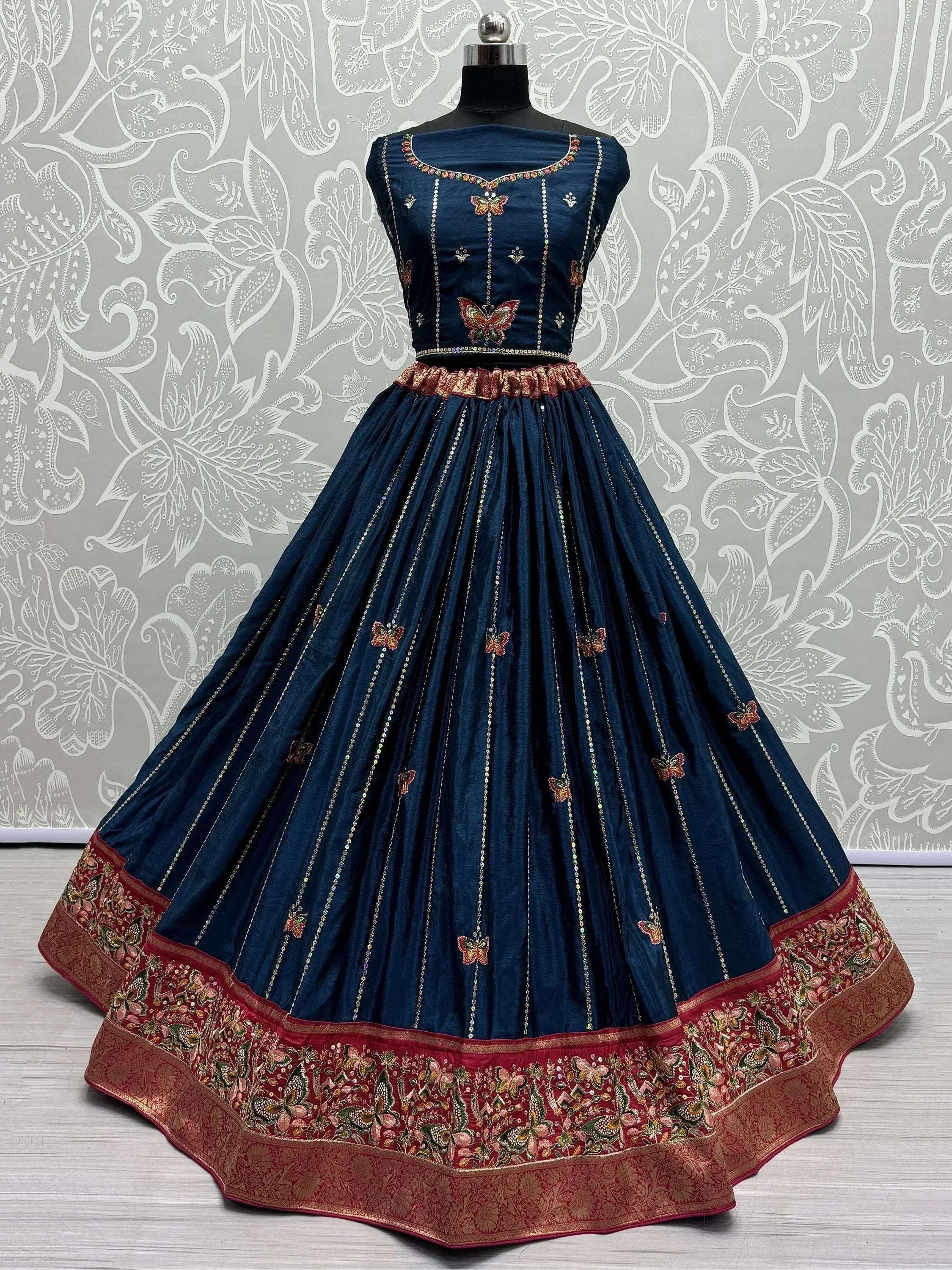 Navy blue lehenga choli with butterfly embroidery and red border, Indian ethnic wear