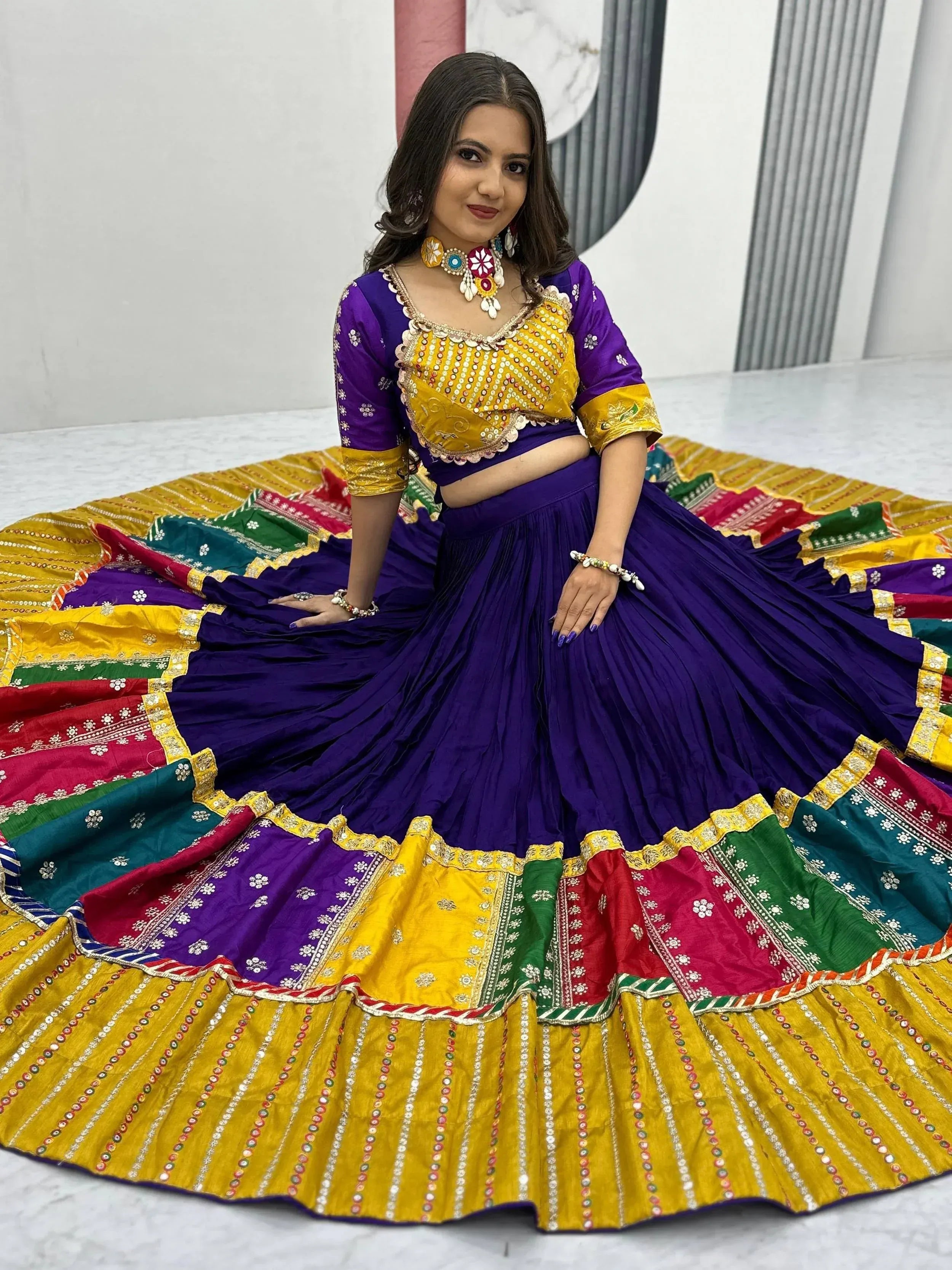 Purple and yellow designer lehenga choli with colorful patchwork skirt, perfect for Indian ethnic wear