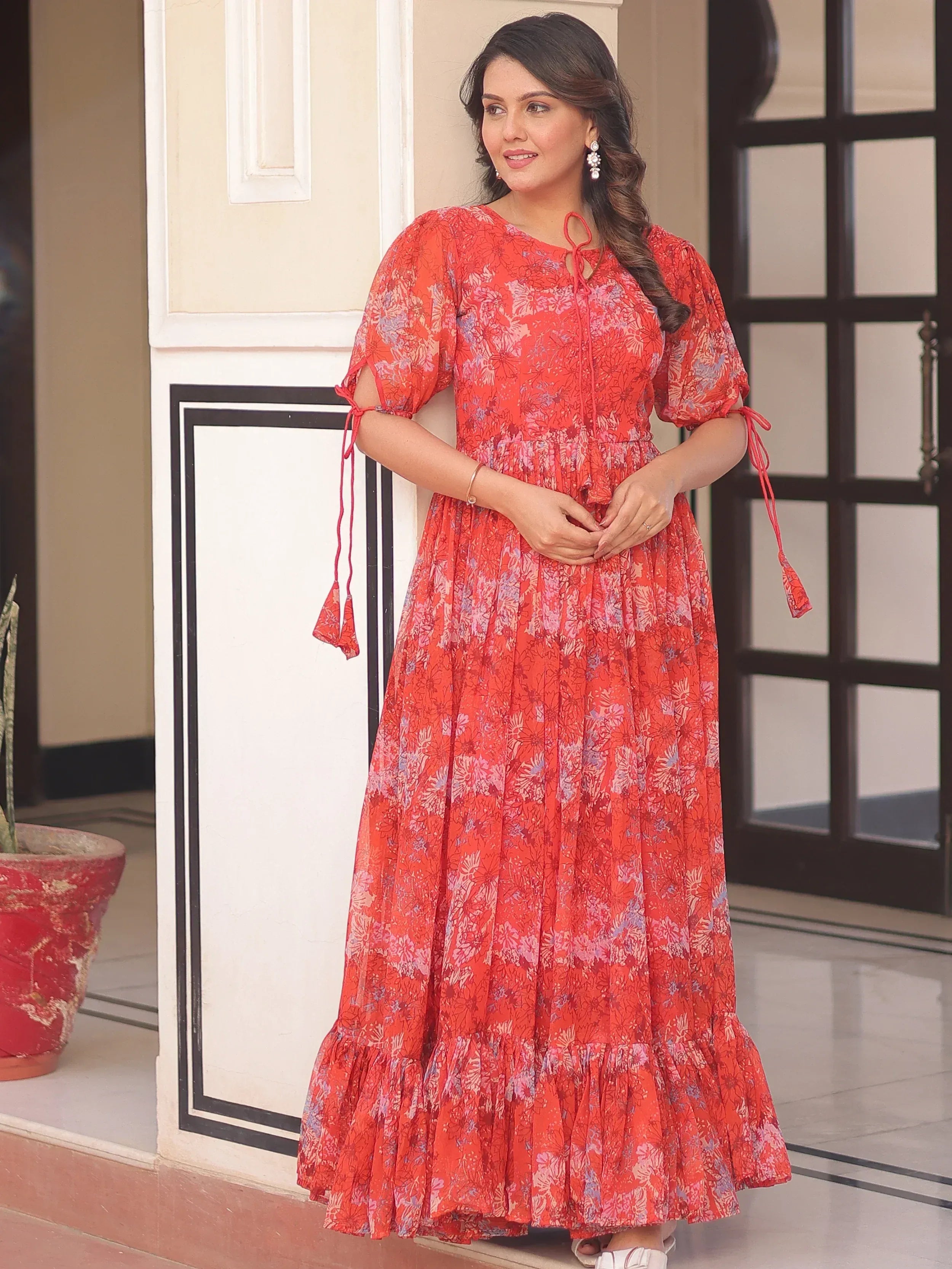 Red floral ethnic gown with puff sleeves and ruffled hem for women