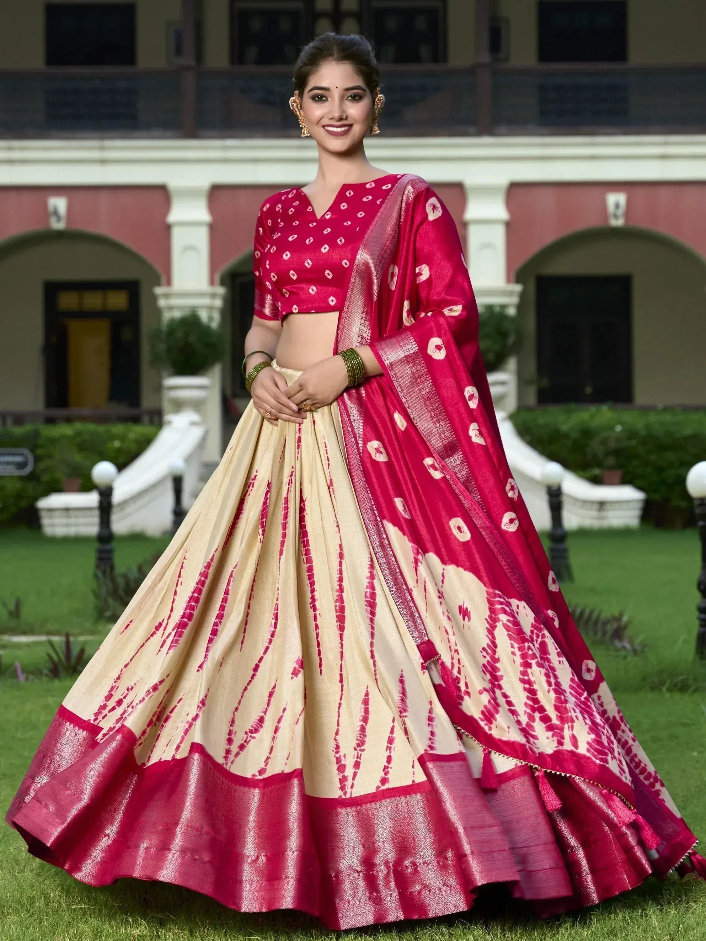 Red and cream designer lehenga choli with printed dupatta, perfect for Indian ethnic occasions