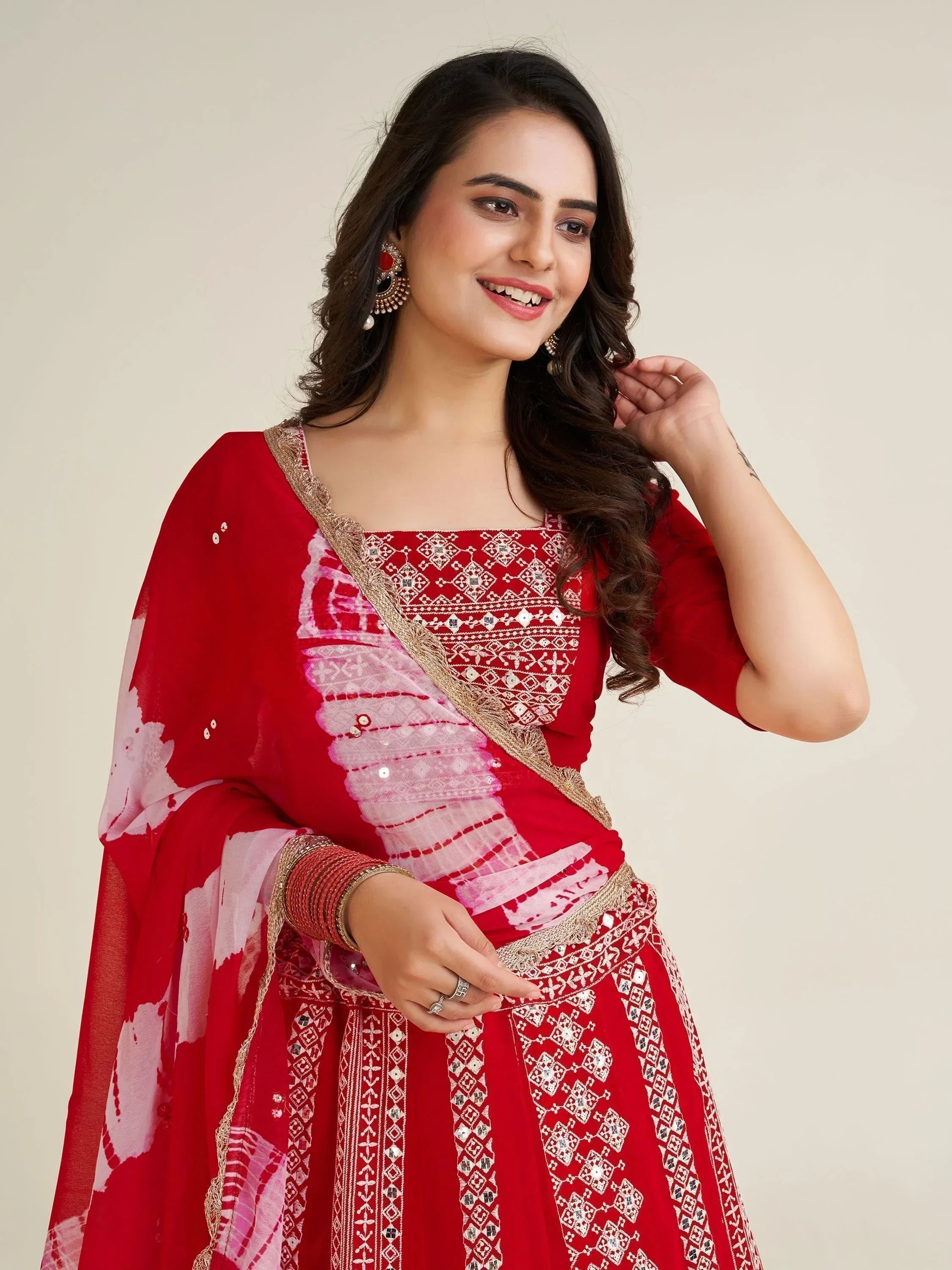 Red embroidered lehenga choli with pink dupatta, perfect for Indian ethnic wear