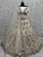 Pretty White Net Zari Work Engagement Wear Lehenga Choli With Dupatta