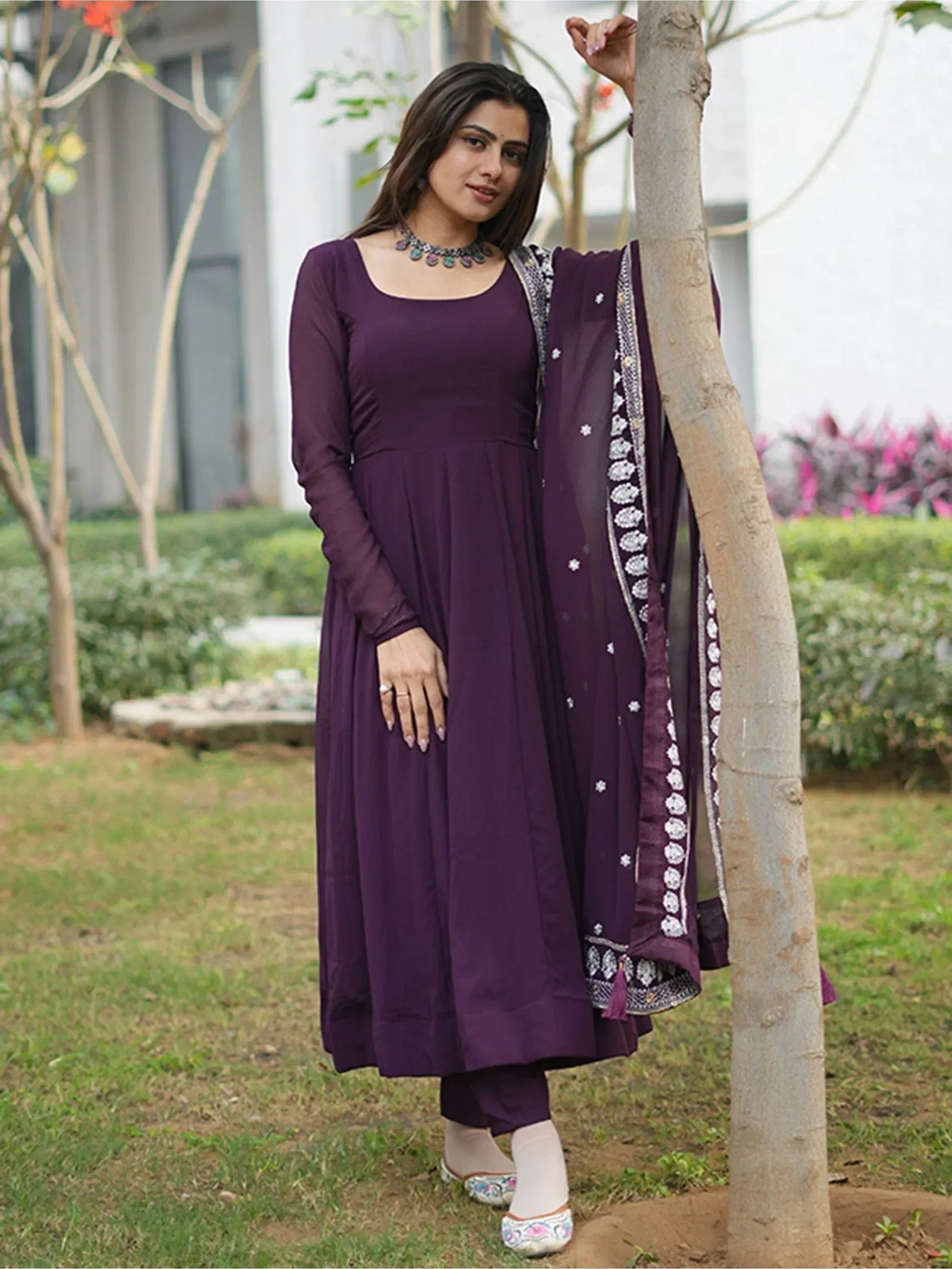 Purple ethnic salwar kameez with embroidered dupatta, perfect for Indian occasions and festive wear.