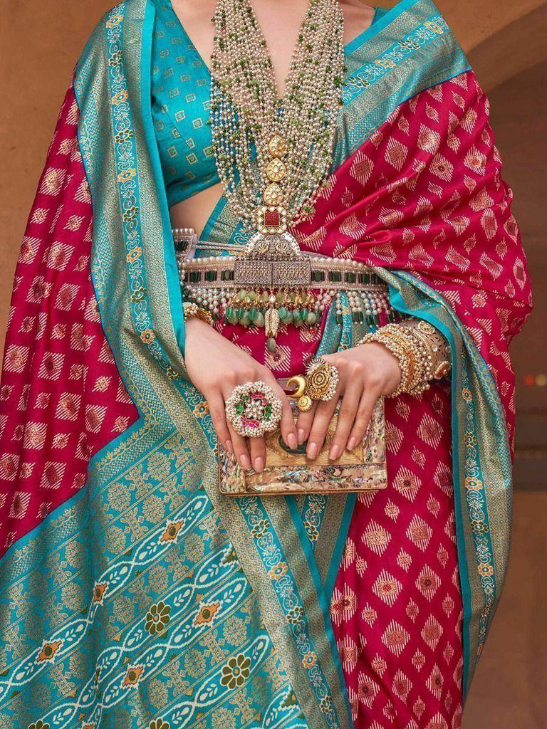 Phenomenal Deep Pink Patola Printed Silk Festival Wear Saree