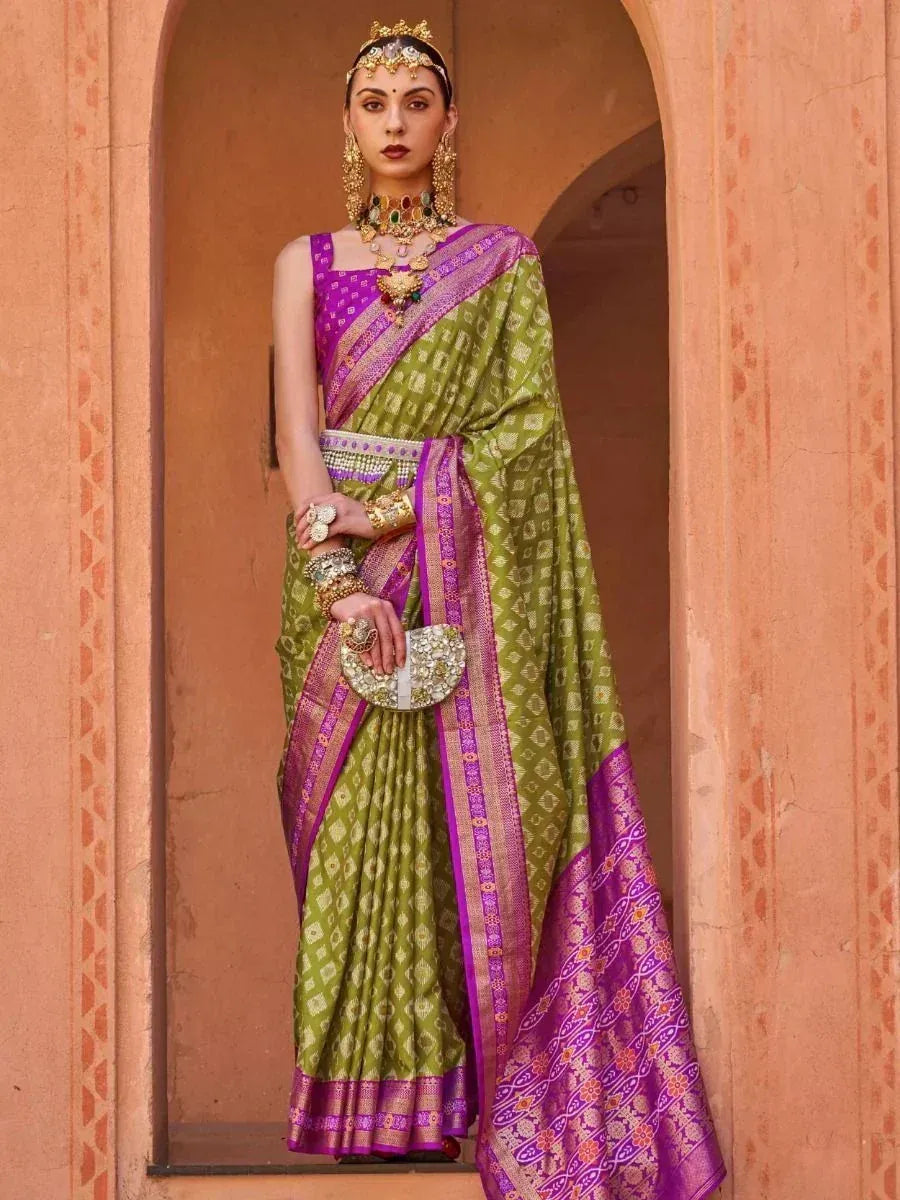 Sumptuous Green Patola Printed Silk Reception Wear Saree With Blouse