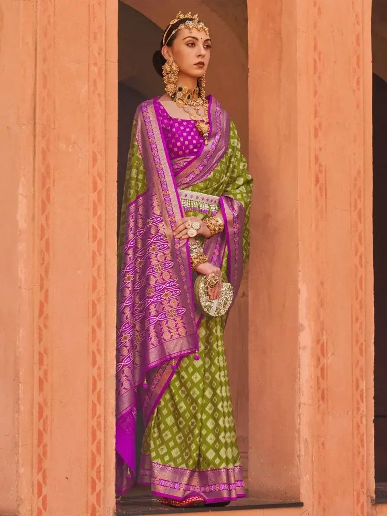 Sumptuous Green Patola Printed Silk Reception Wear Saree With Blouse