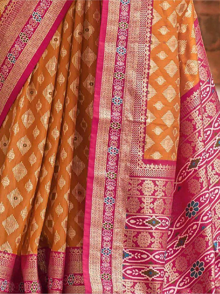 Enthralling Mustard Yellow Patola Printed Silk Traditional Saree