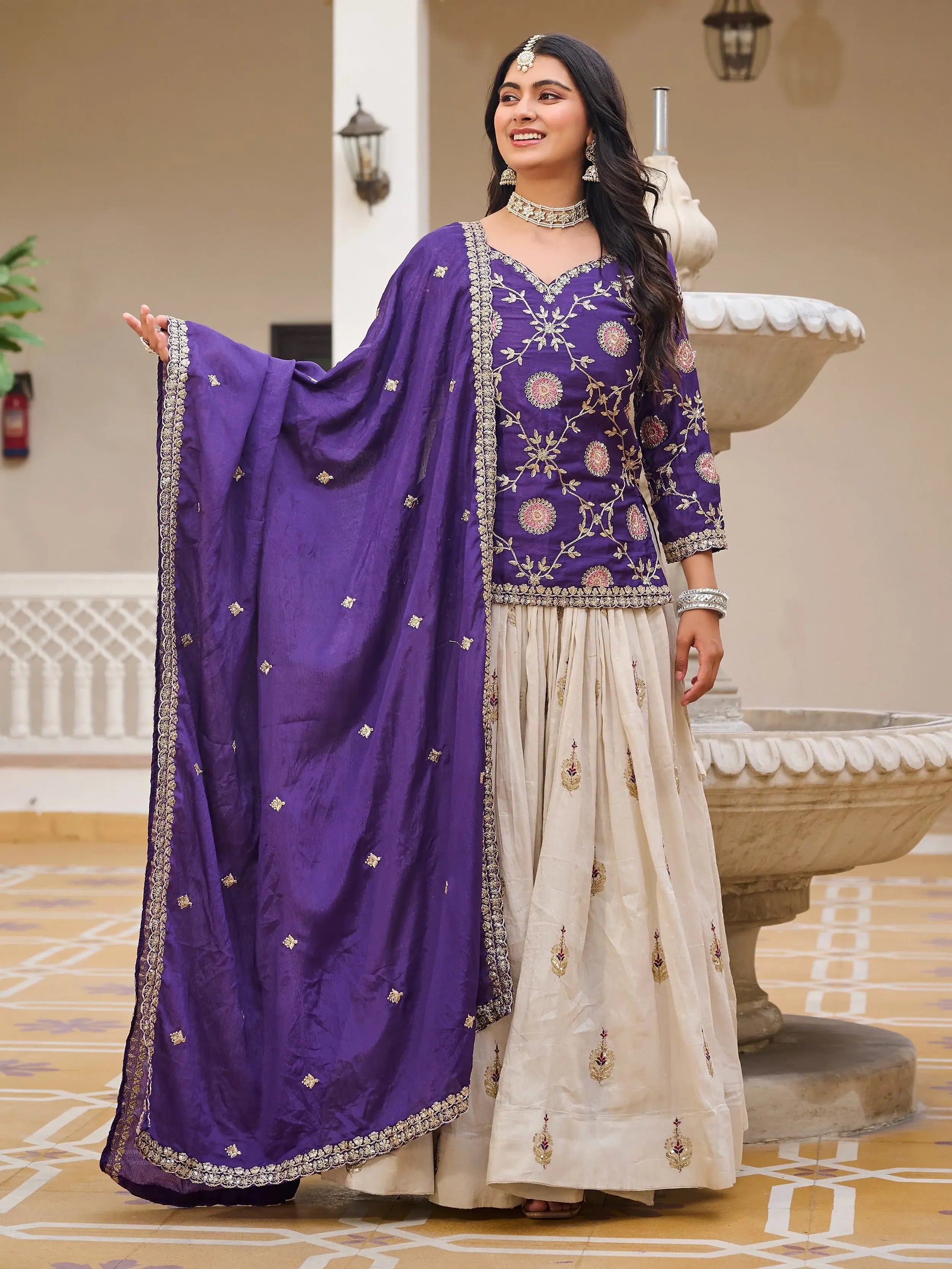 Impressive Purple Sequins Embroidered Chinon Lehenga With Long Choli