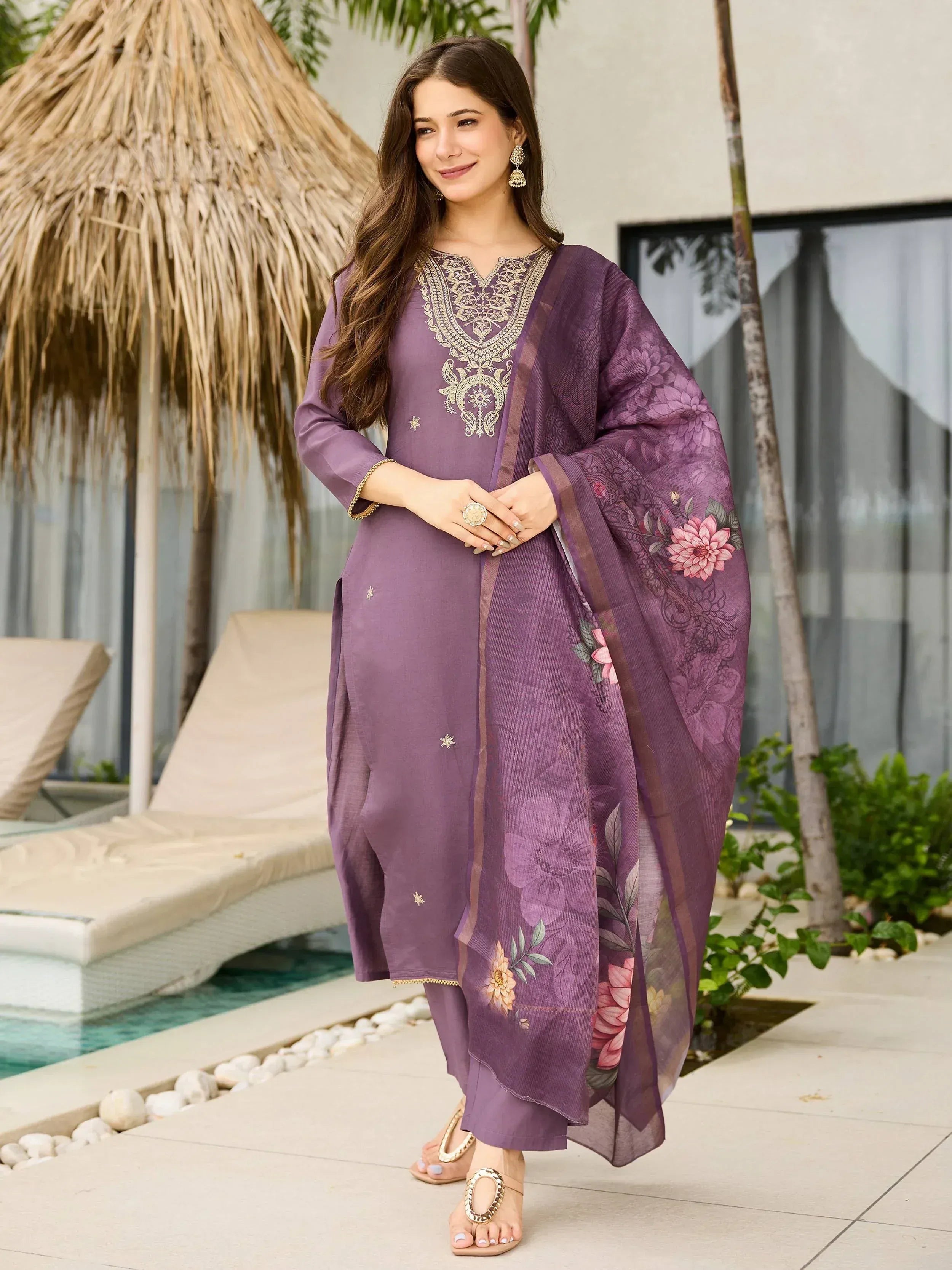 Purple embroidered salwar kameez with floral dupatta, perfect for ethnic occasions