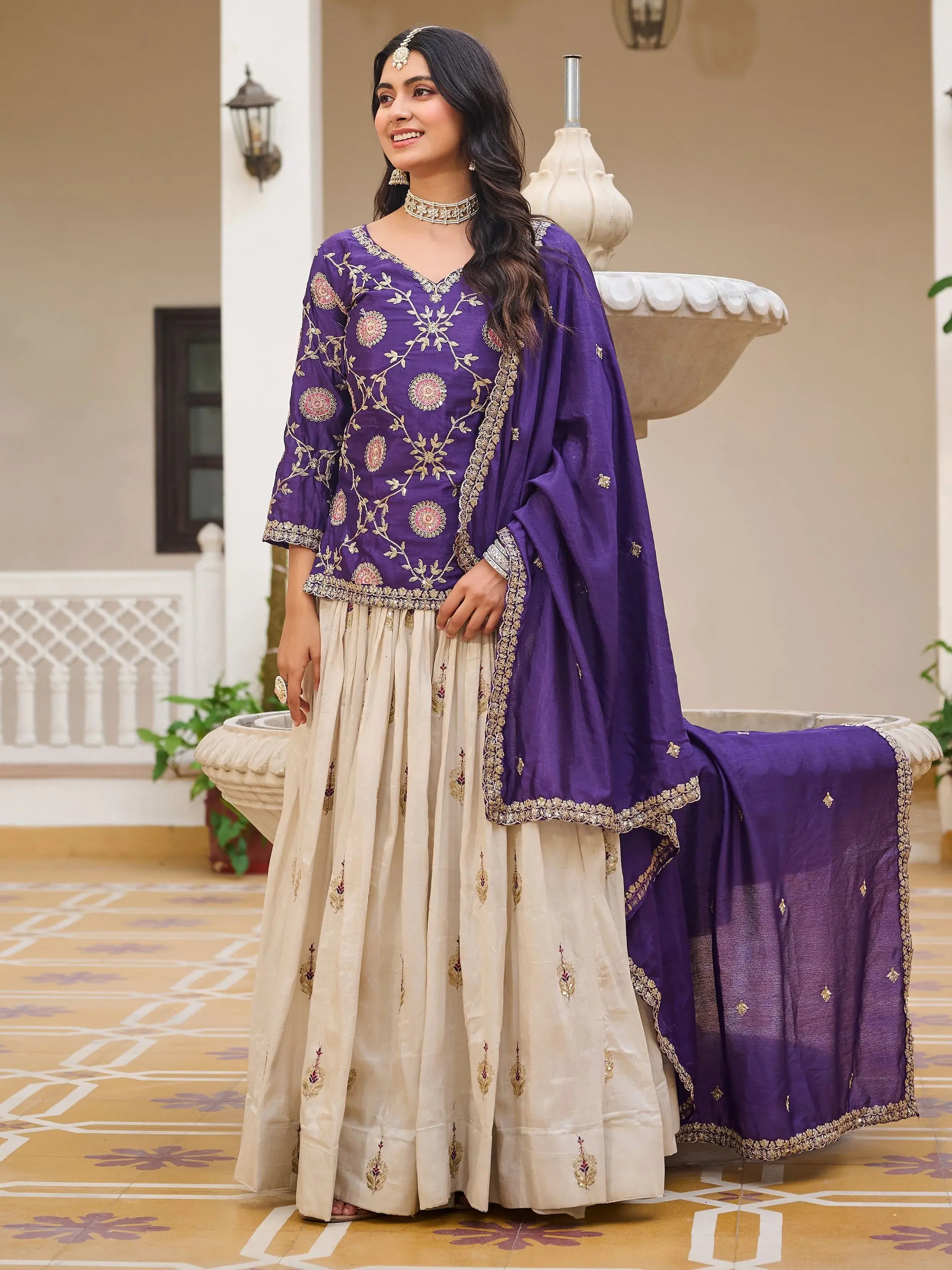 Impressive Purple Sequins Embroidered Chinon Lehenga With Long Choli