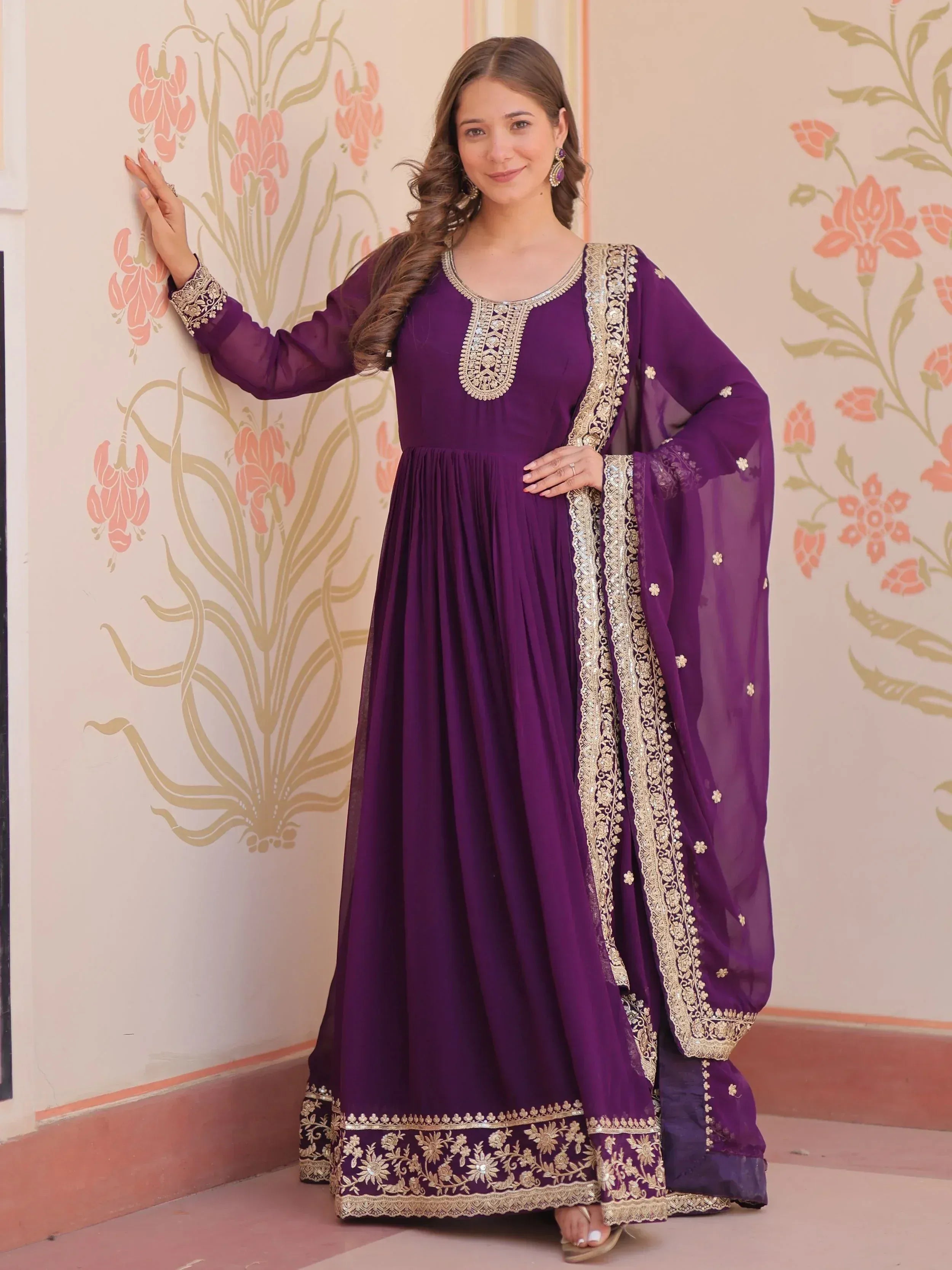 Purple ethnic anarkali suit with gold embroidery and dupatta, perfect for Indian occasions