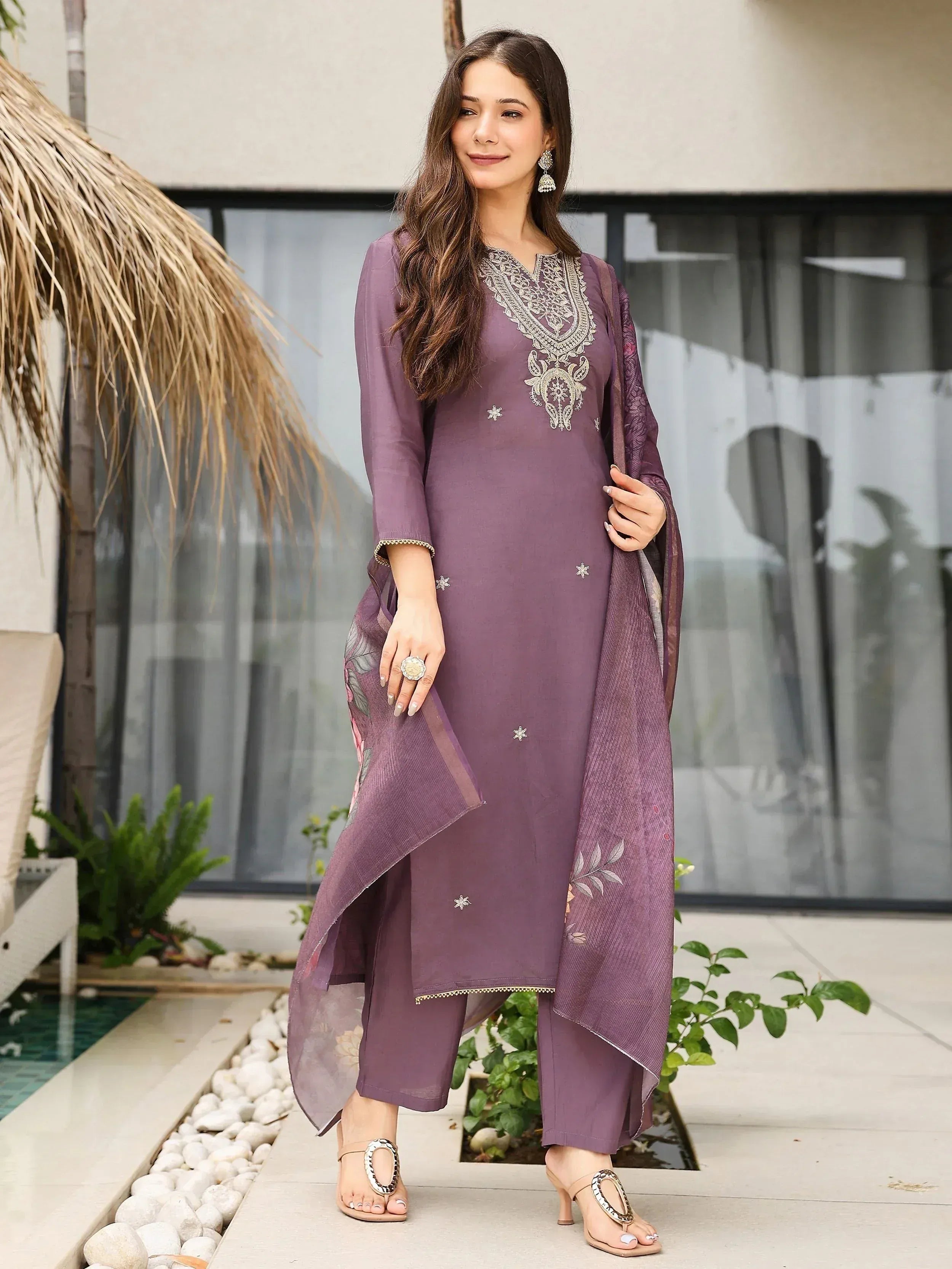 Purple embroidered salwar kameez with floral dupatta, perfect for ethnic occasions