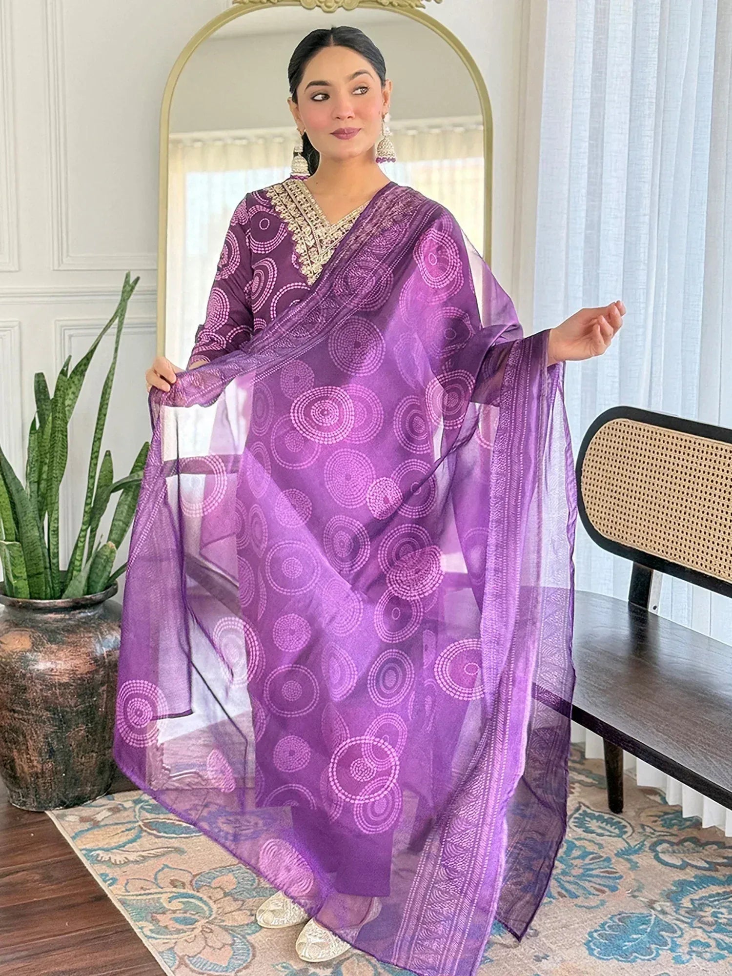 Purple printed ethnic gown with sheer dupatta, perfect for Indian occasions and festive wear