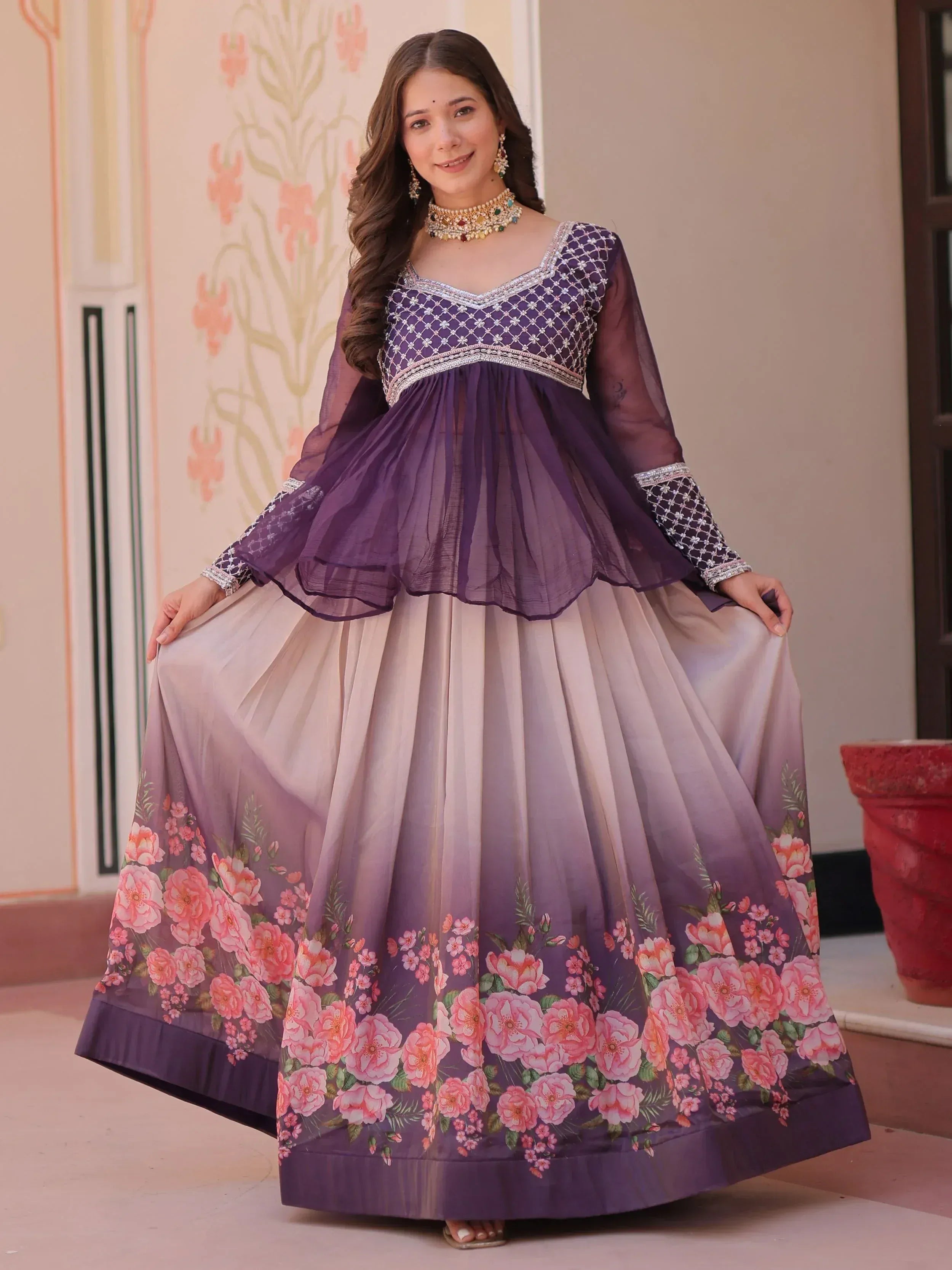 Purple floral printed ethnic gown with embroidered blouse, perfect for Indian occasions and festive wear.