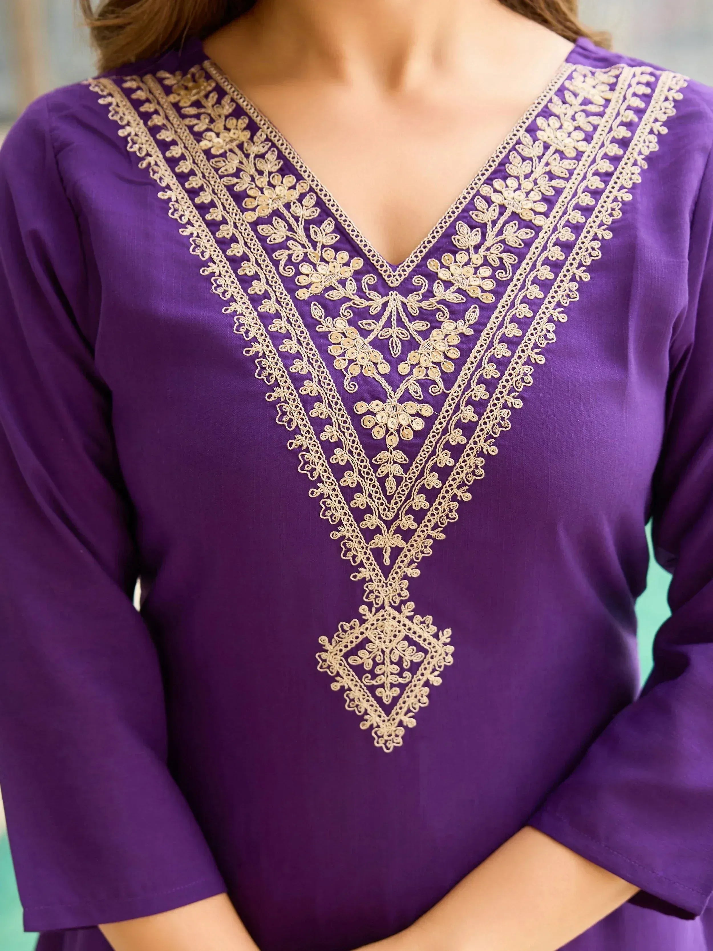 Purple ethnic kurti with gold floral embroidery, V-neck design, perfect for Indian wear