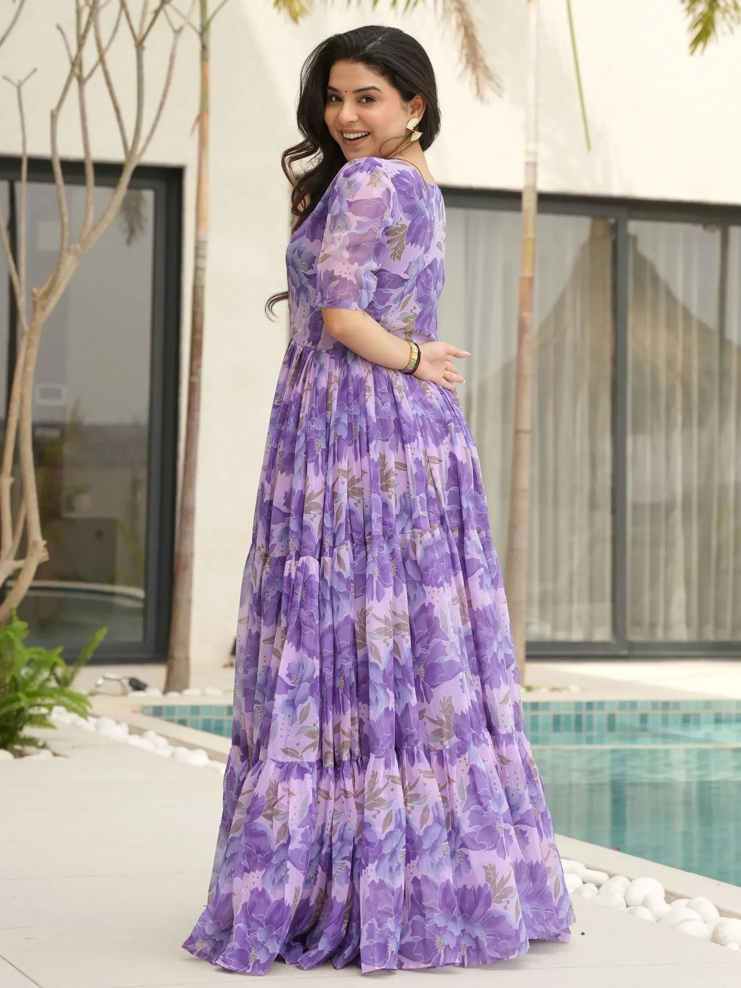 Purple floral ethnic gown with tiered skirt, perfect for Indian occasions and parties