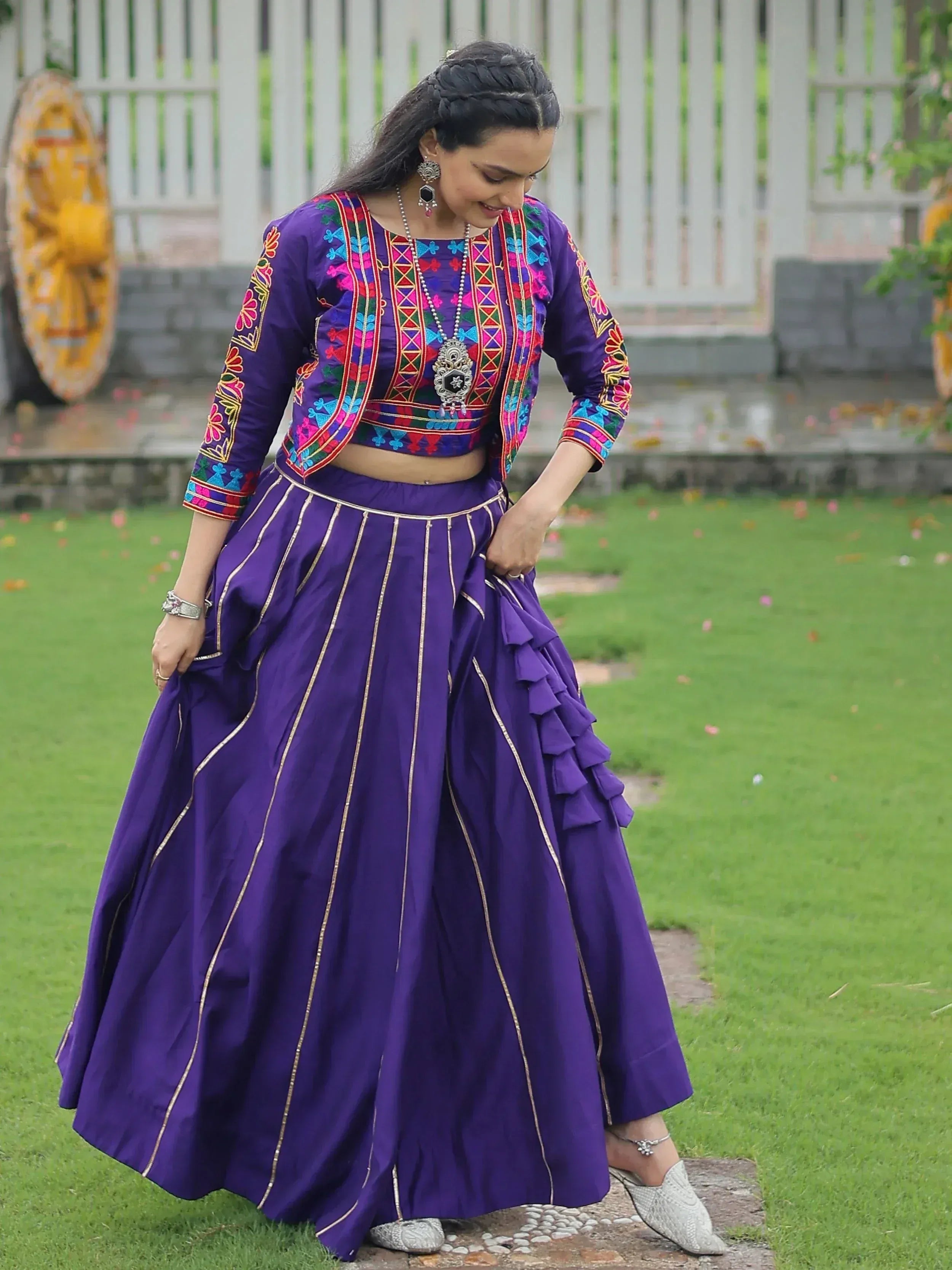 Purple embroidered lehenga choli with ruffle skirt, perfect for Indian ethnic wear occasions