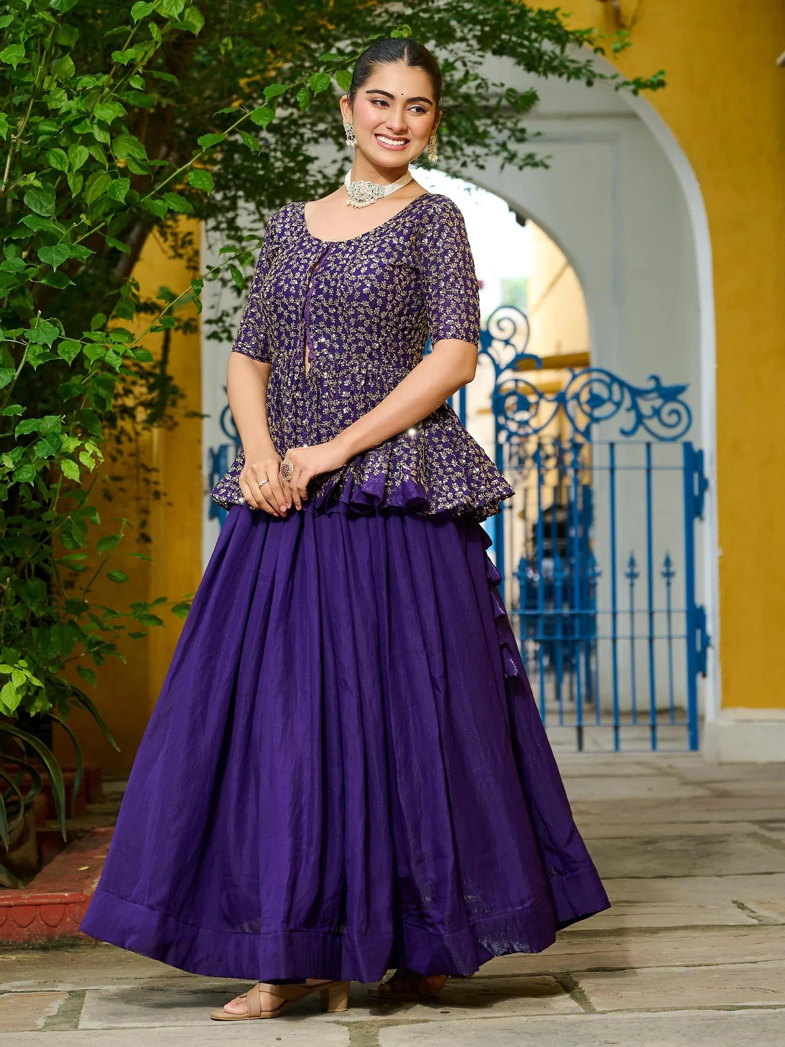Fascinating Purple Silk Embroidered Peplum Top With Lehenga