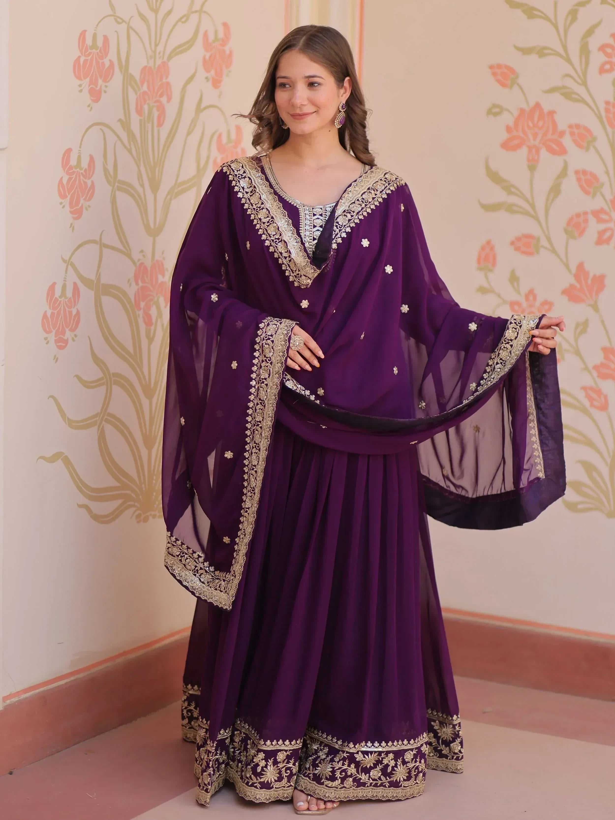 Purple ethnic sharara suit with gold embroidery, perfect for Indian weddings and festive occasions