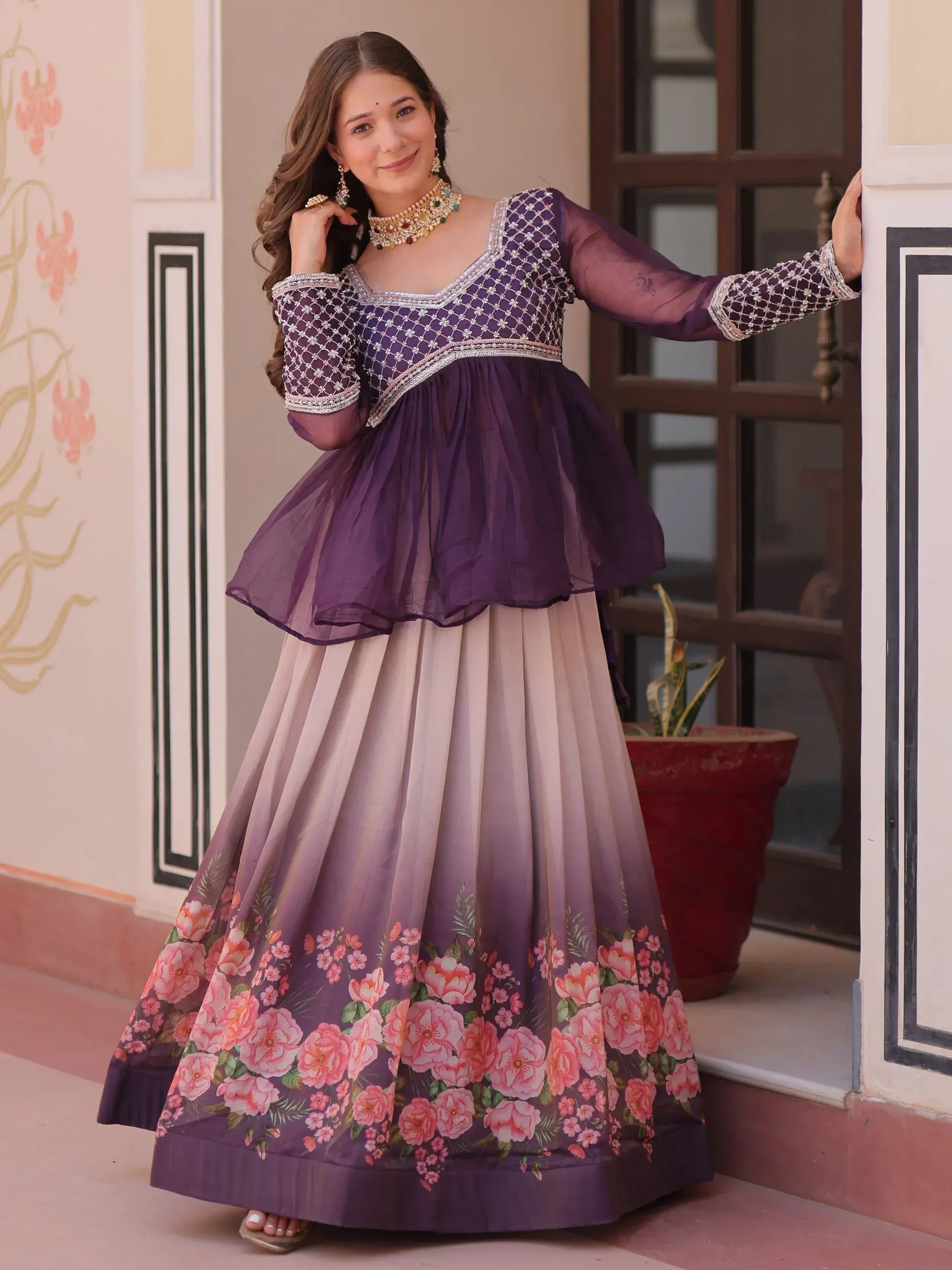 Purple floral lehenga choli with net overlay and embroidery, perfect for Indian ethnic wear occasions