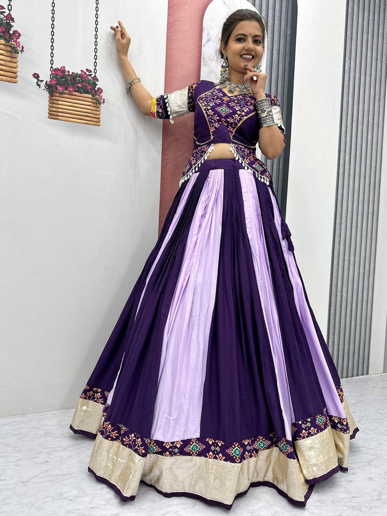 Purple and lavender embroidered lehenga choli with mirror work, perfect for Indian ethnic wear occasions.