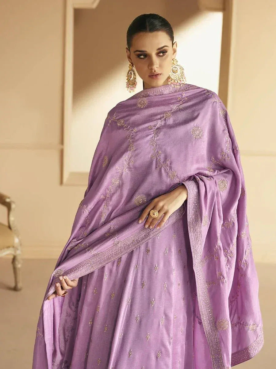 Lavender embroidered salwar kameez with gold detailing, perfect for Indian ethnic occasions