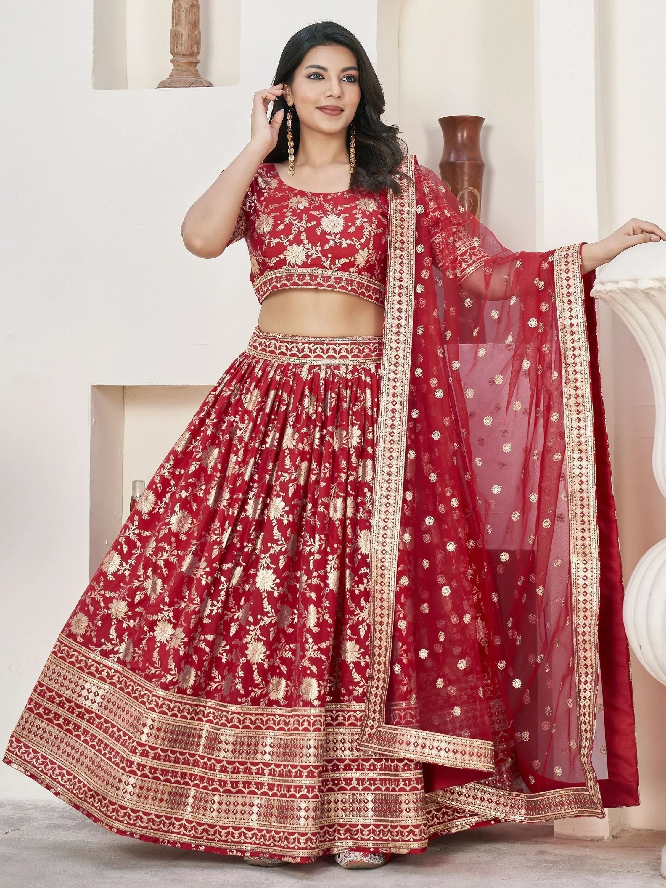 Red and gold embroidered lehenga choli with sheer dupatta, Indian ethnic wear for weddings and festivals