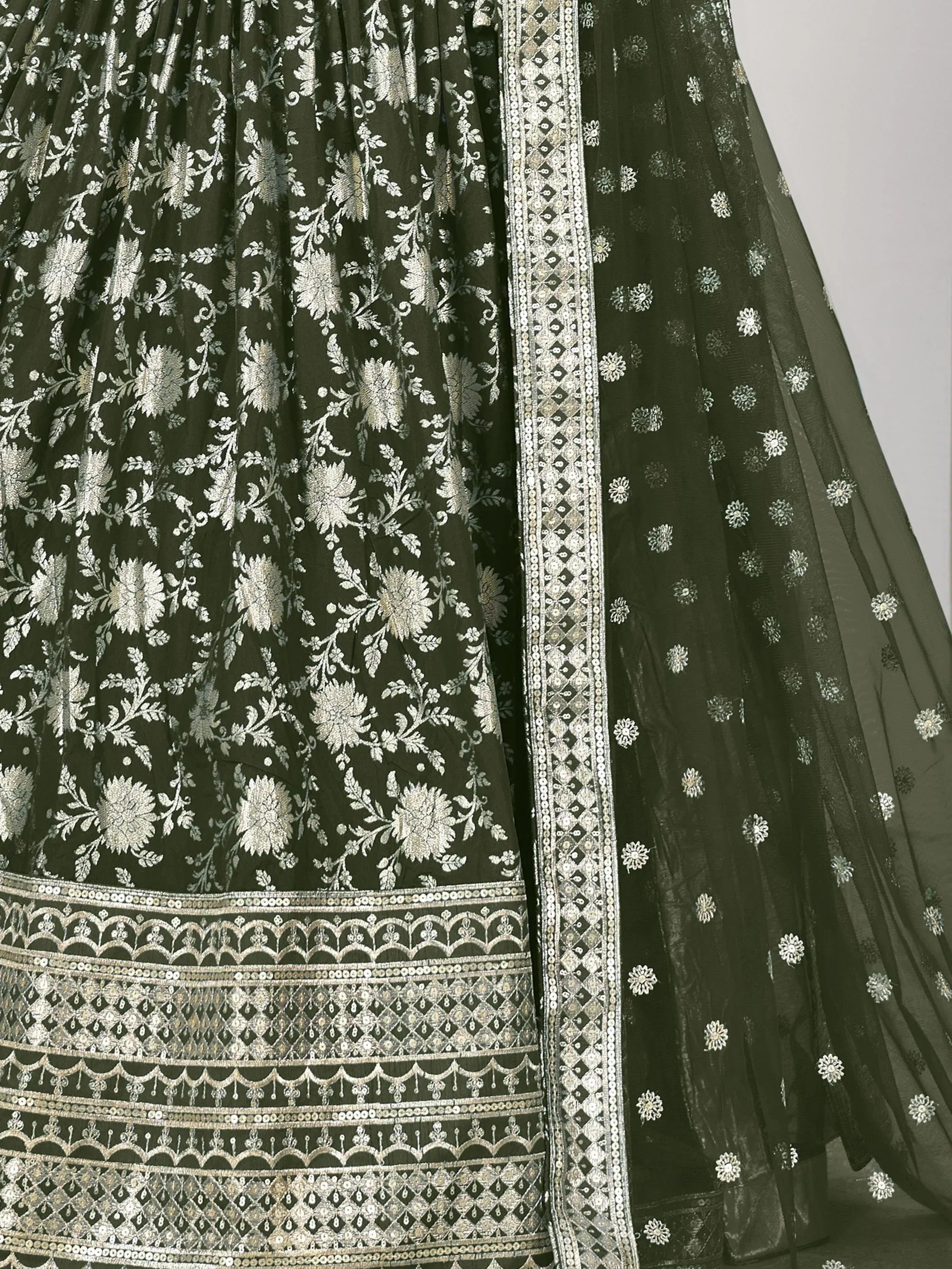 Olive green lehenga with silver floral embroidery and sequin border, ethnic Indian wear