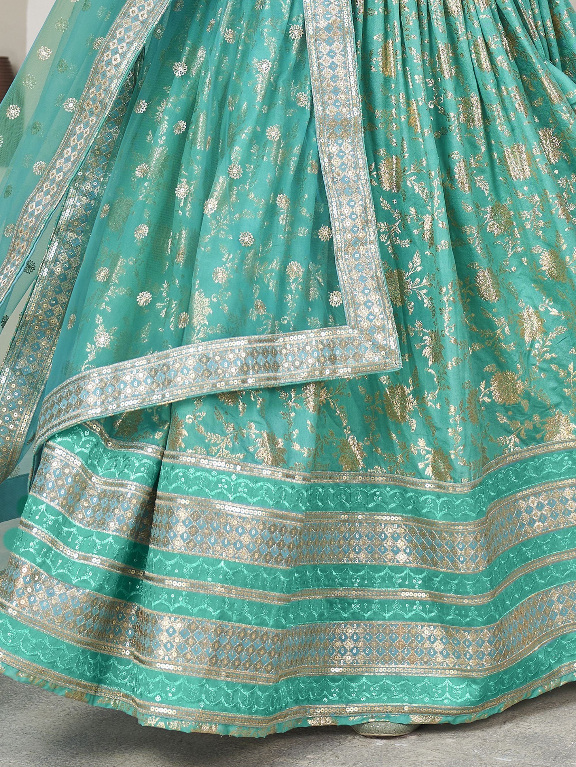 Teal green lehenga with gold floral embroidery and sequin border, ethnic Indian wear