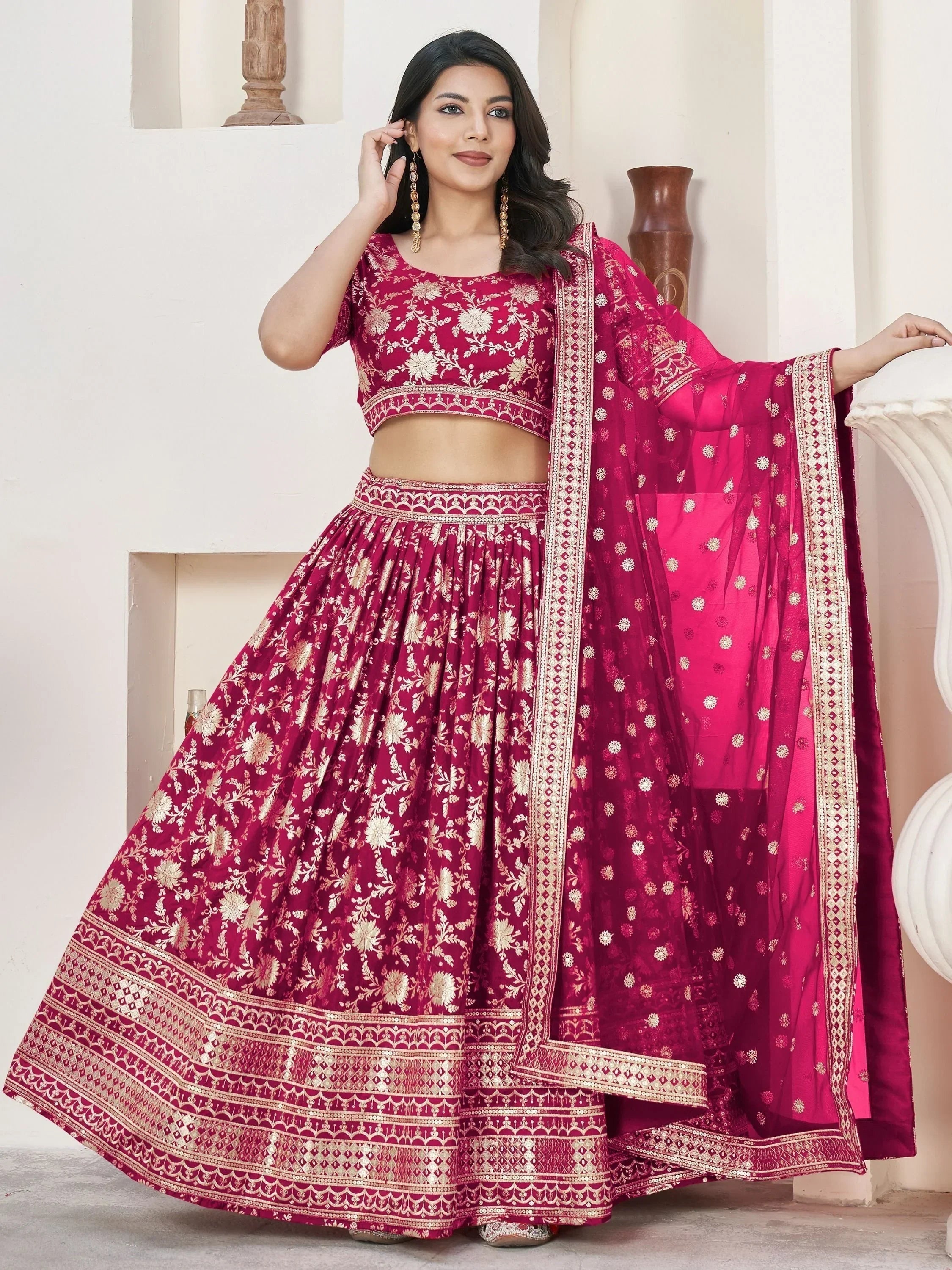 Burgundy lehenga choli with gold floral embroidery and matching dupatta, ideal for Indian ethnic occasions
