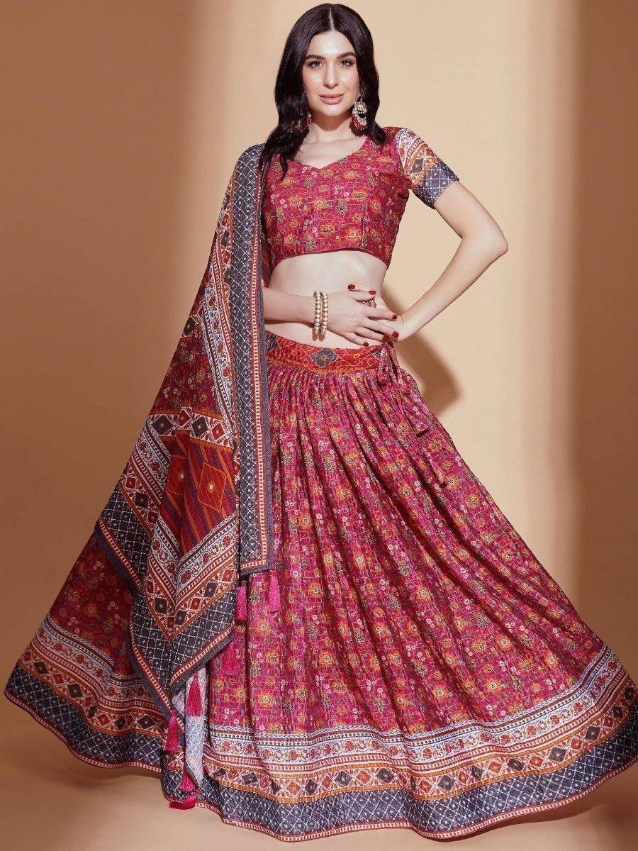 Red printed lehenga choli with ethnic patterns and dupatta, perfect for Indian weddings and festive occasions