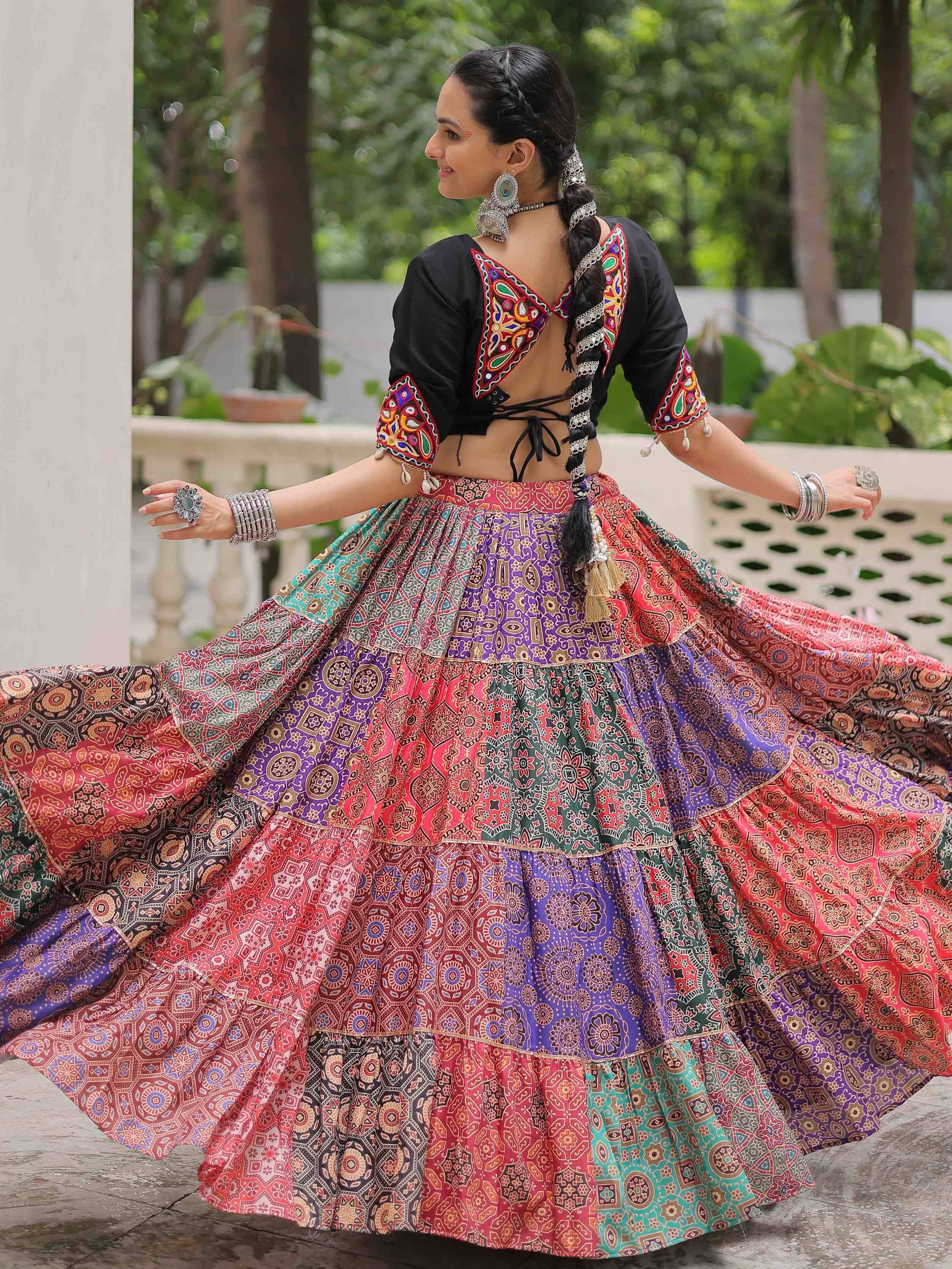 Colorful ethnic lehenga choli with intricate patterns and embroidery, perfect for festive occasions.