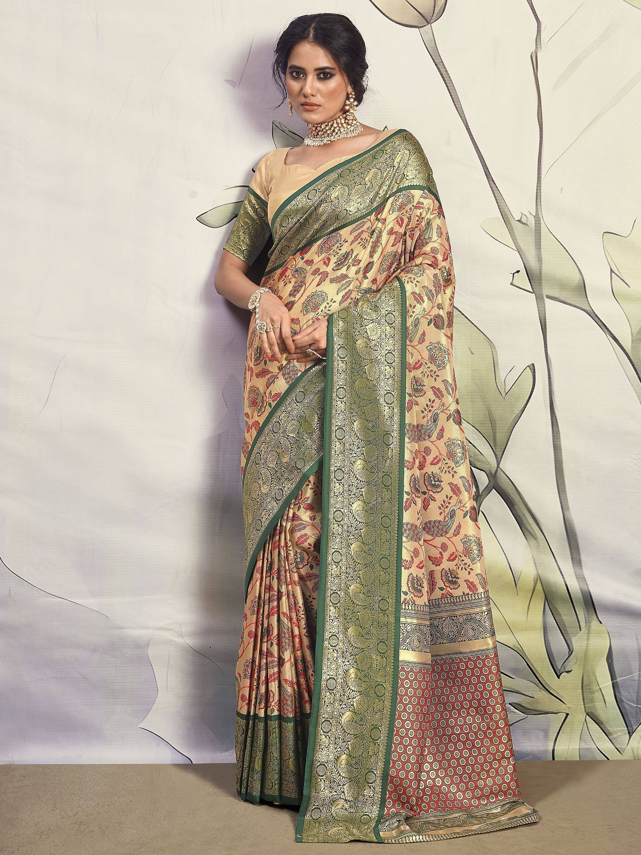 Elegant beige saree with green border and floral peacock print, perfect for Indian ethnic occasions