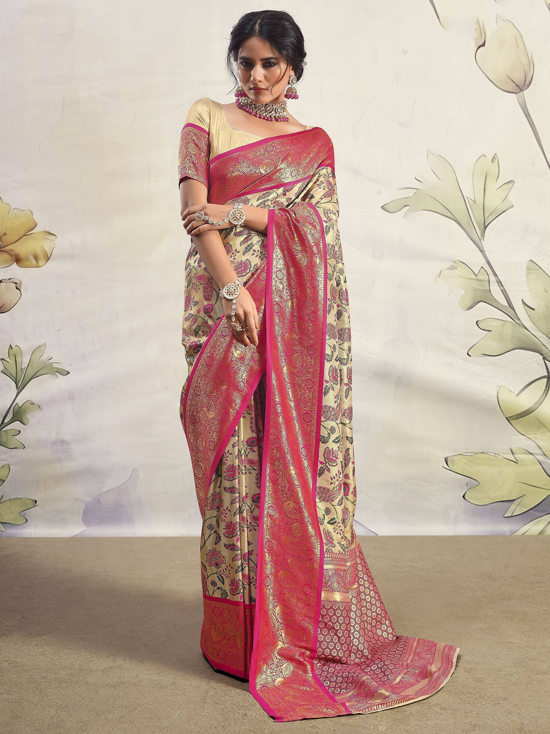 Elegant pink and gold floral saree with intricate border, perfect for Indian ethnic wear occasions.