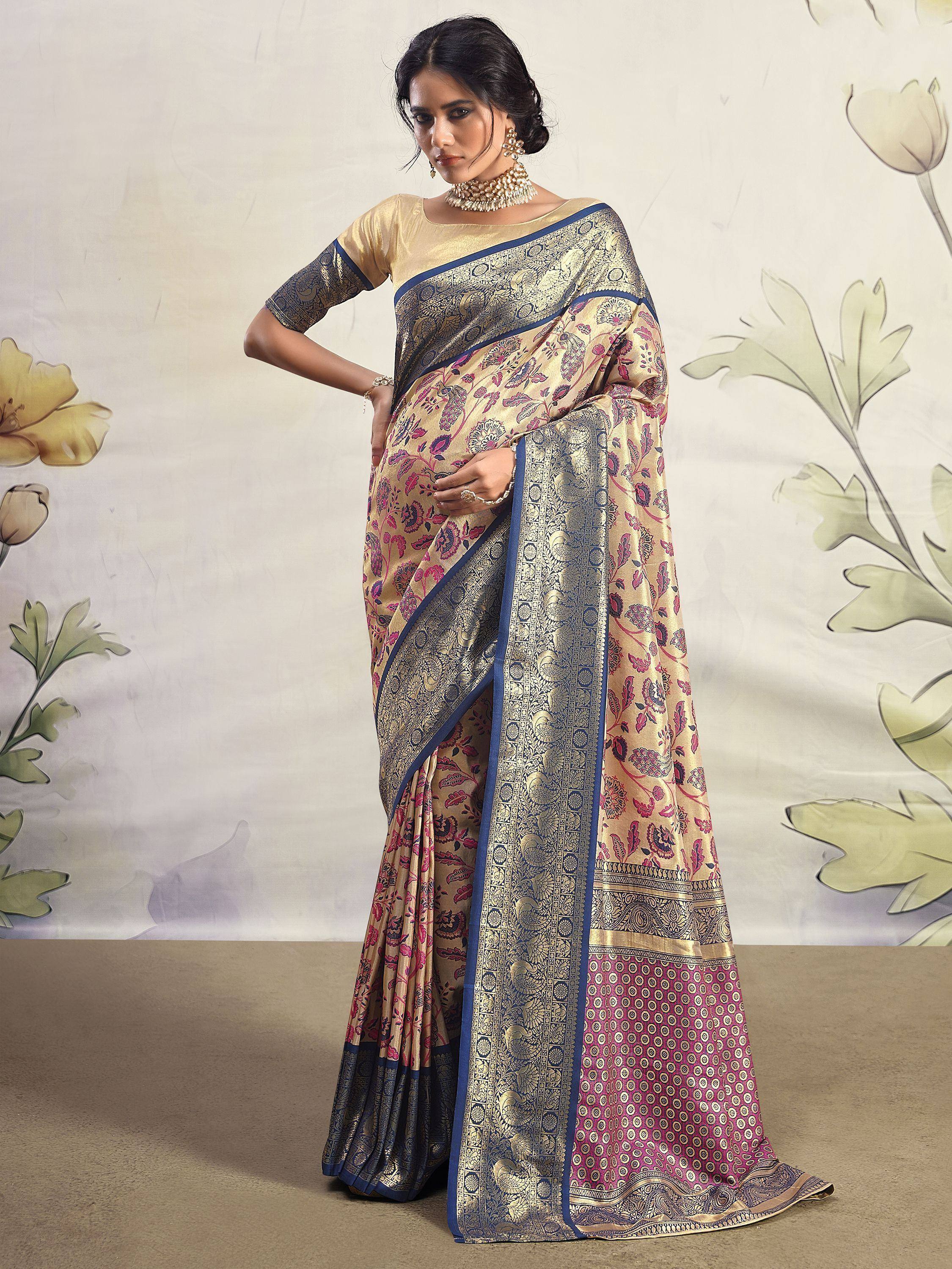 Elegant floral print saree with gold and blue border, perfect for Indian ethnic occasions