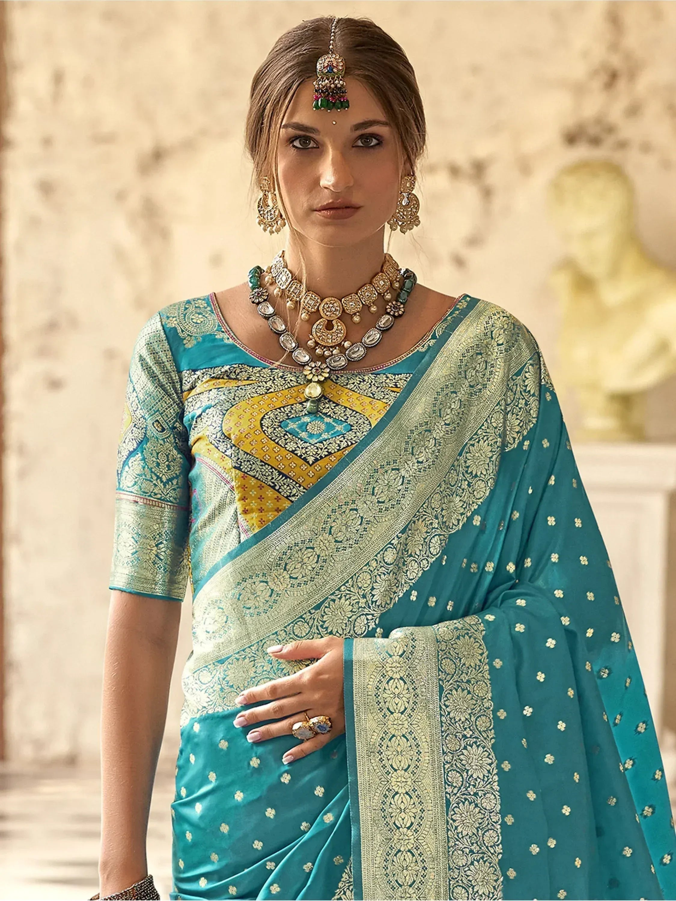 Teal designer saree with gold embroidery, traditional Indian ethnic wear, perfect for weddings and festivals