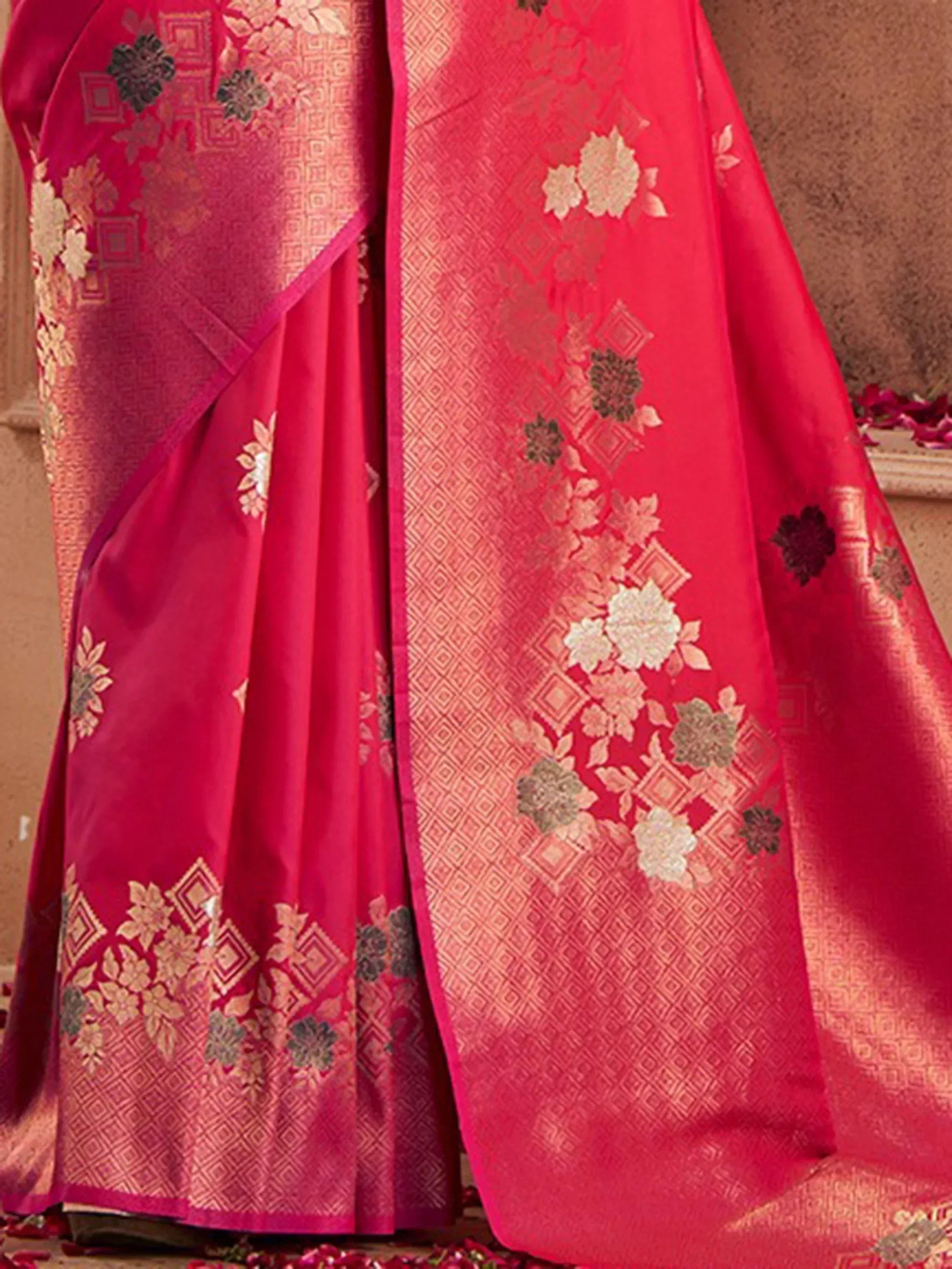 Vibrant red designer saree with gold floral embroidery and geometric border, perfect for Indian ethnic wear
