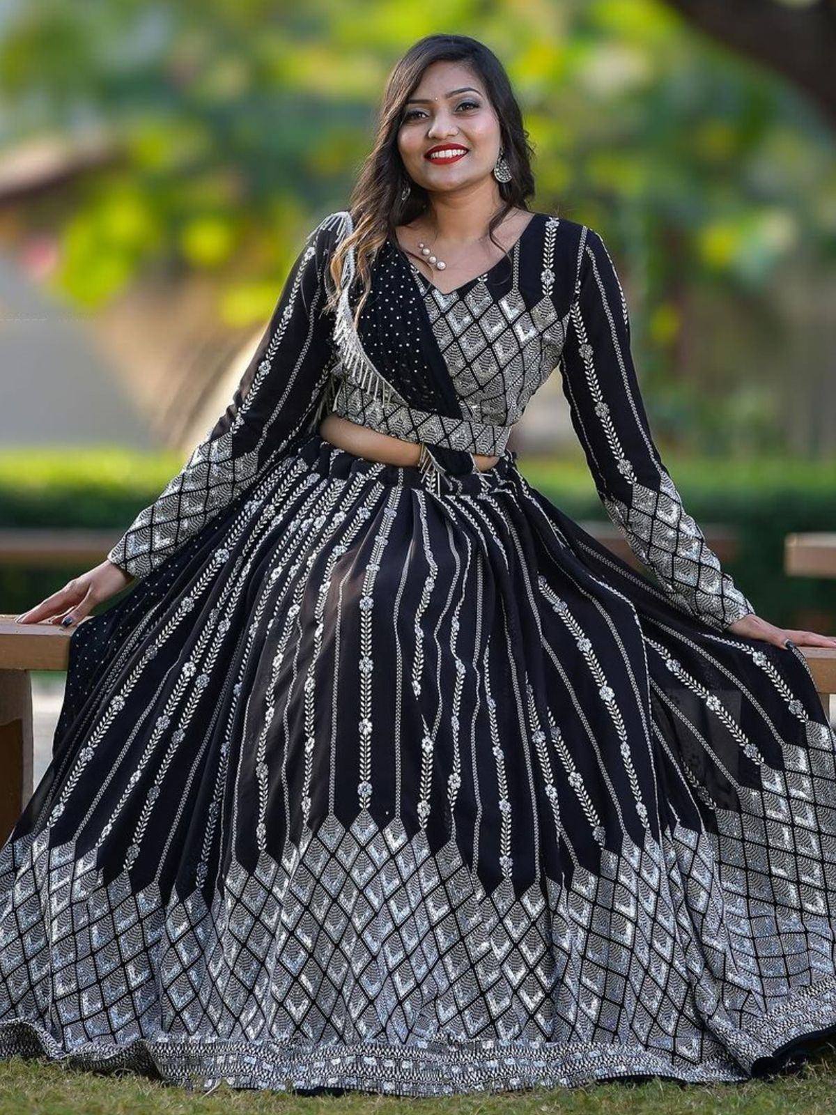 Black and silver embroidered lehenga choli with geometric patterns, perfect for Indian ethnic wear events