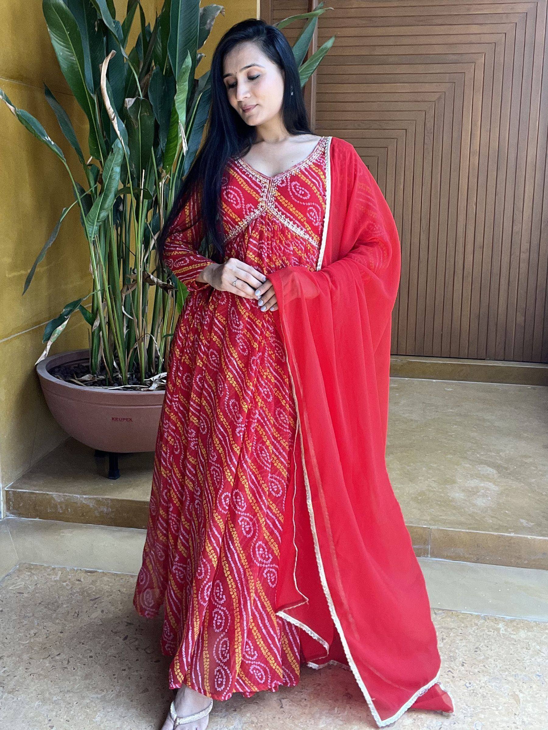 Red printed ethnic gown with sheer dupatta, perfect for Indian occasions and festive wear