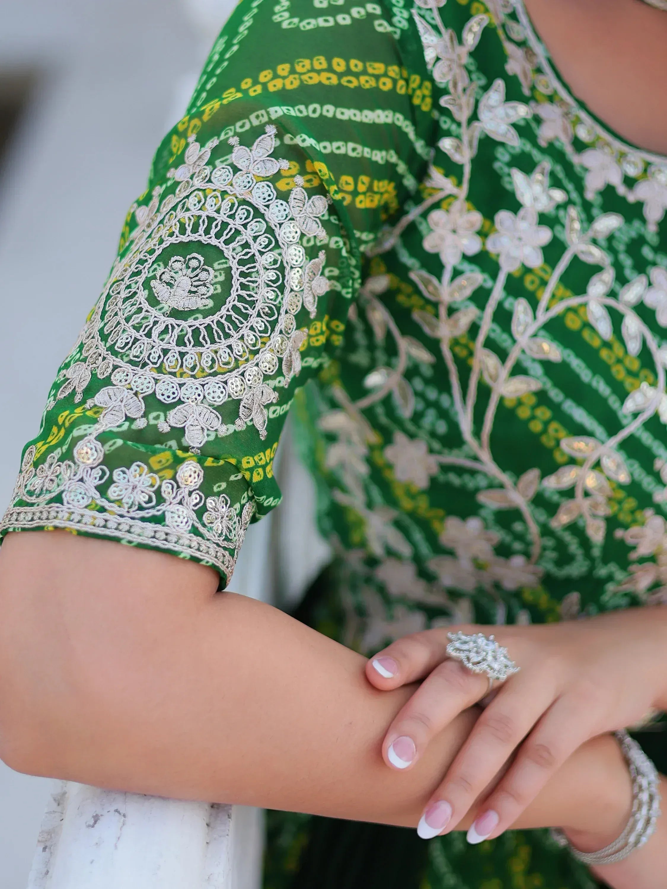 Green embroidered ethnic kurti with floral detailing and silver embellishments