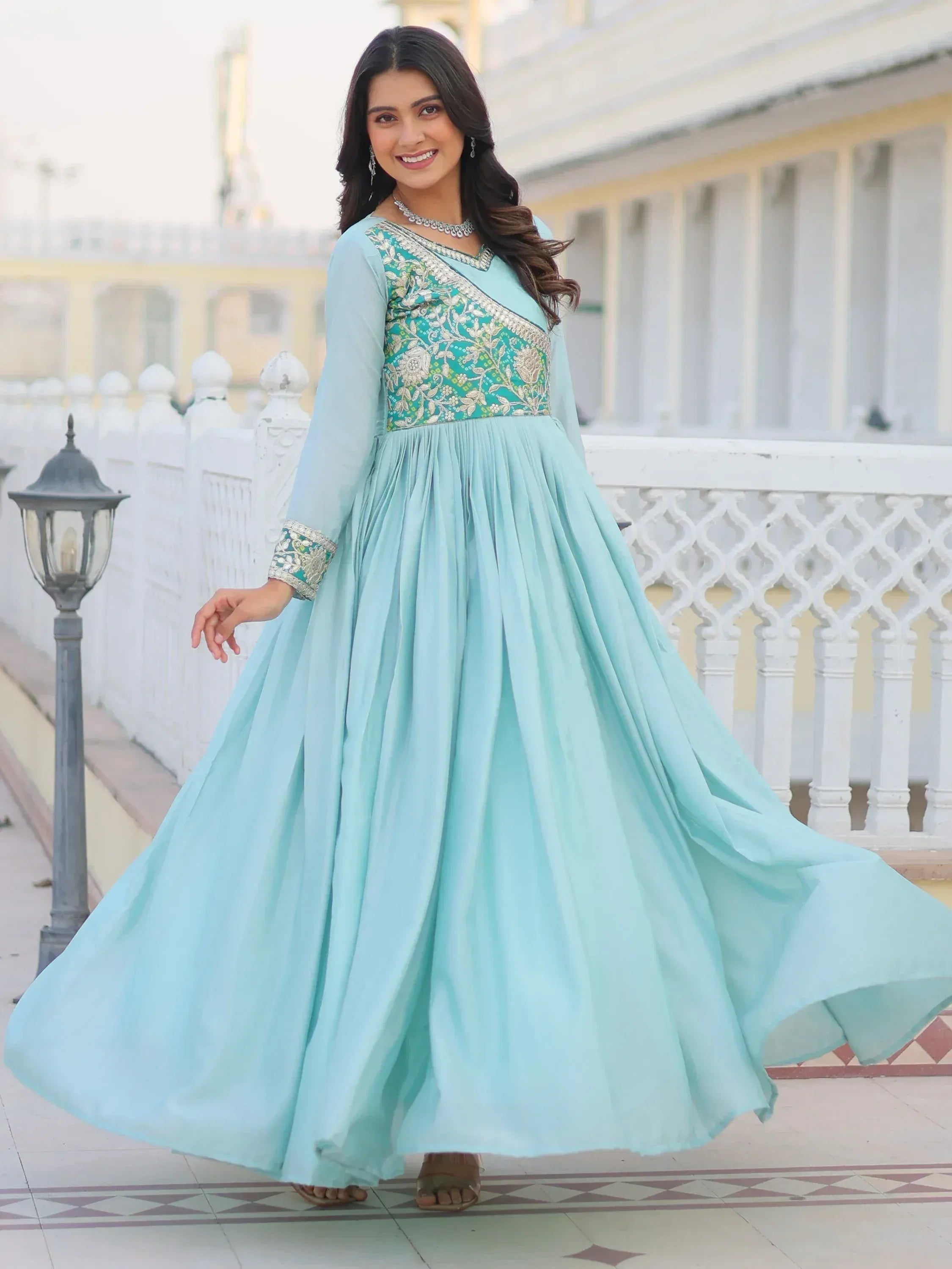 Mint green embroidered anarkali gown with floral detailing, perfect for Indian ethnic occasions