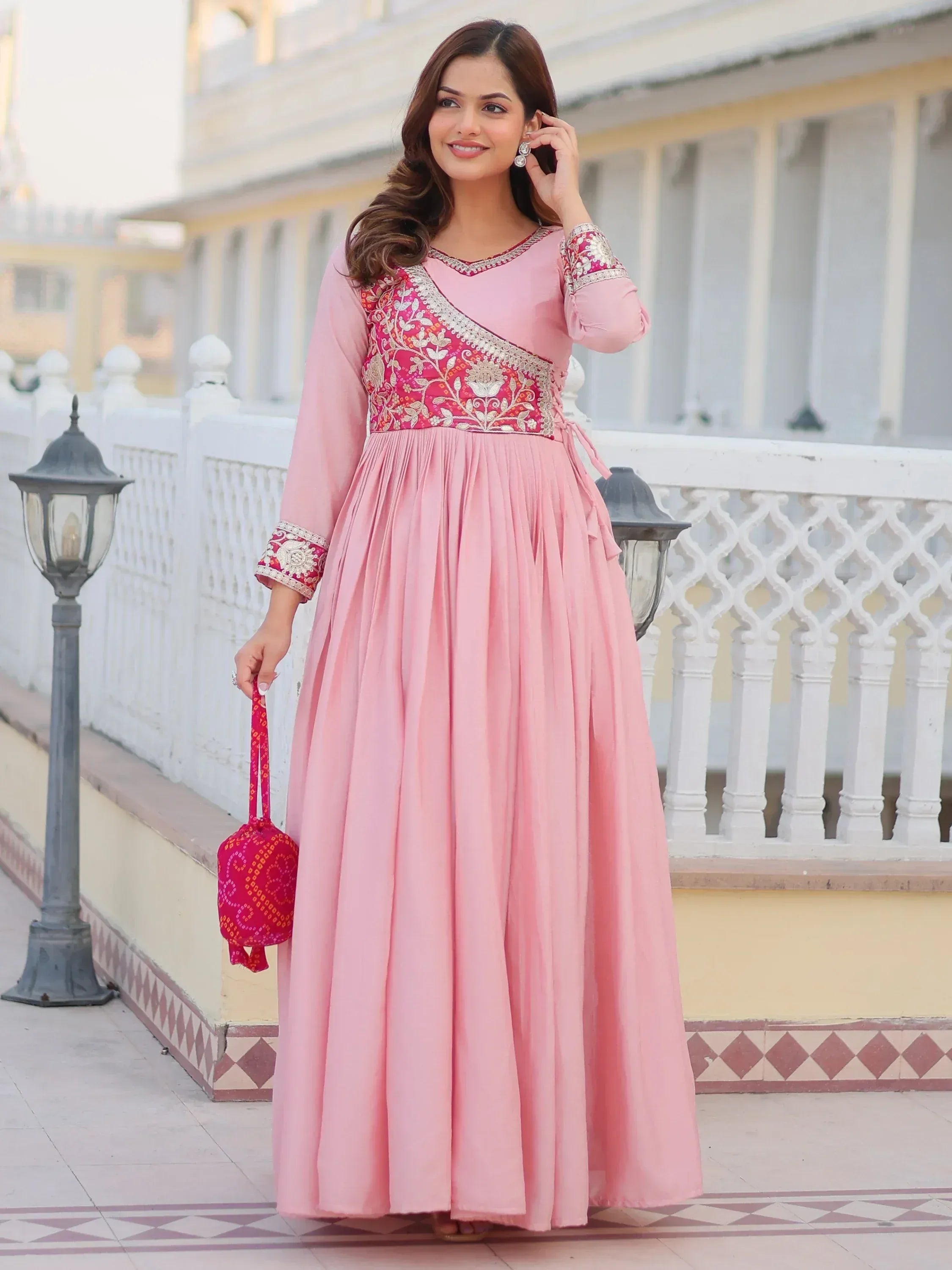 Pink ethnic gown with red gold embroidery, perfect for Indian occasions and festive wear