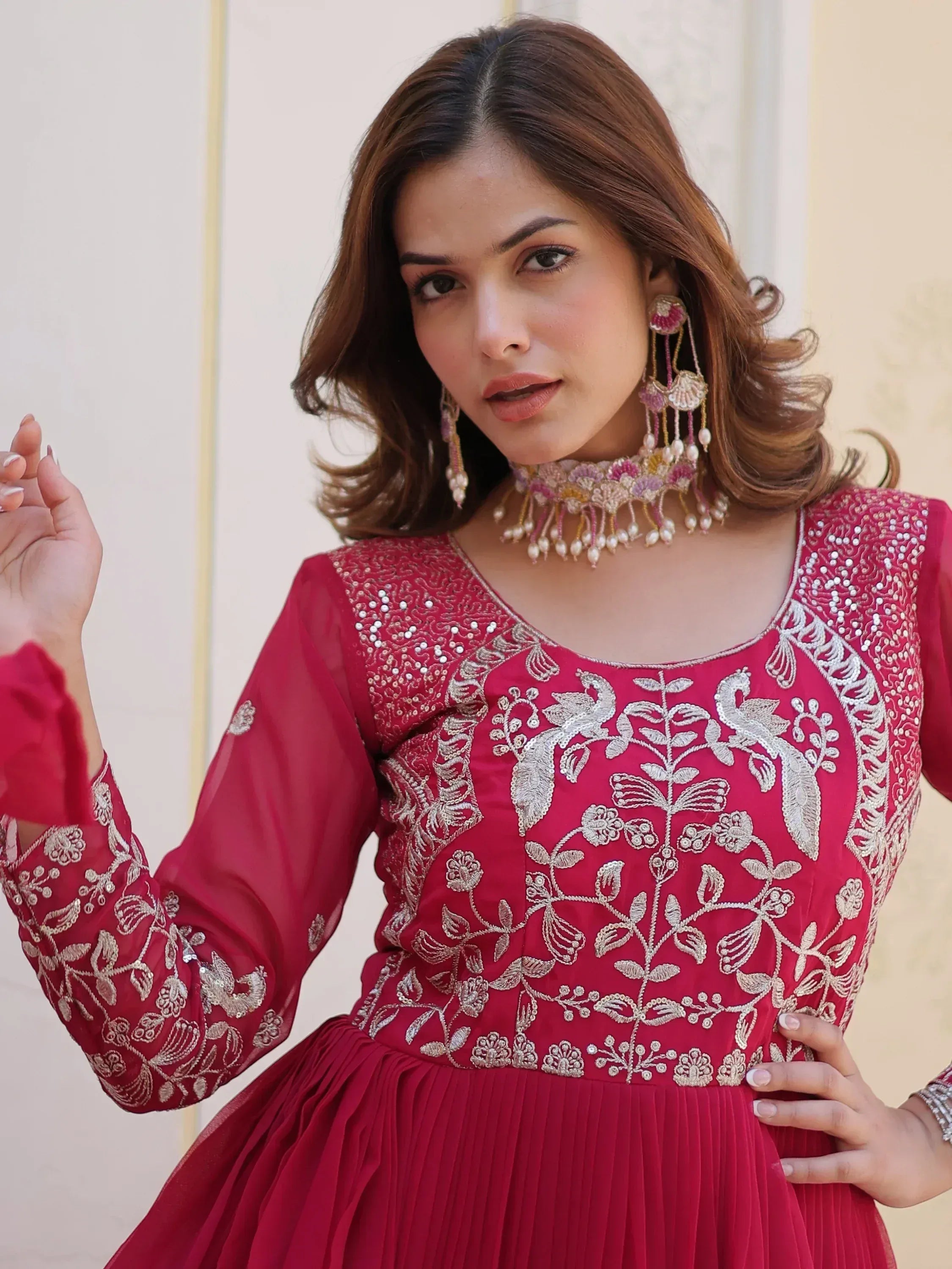 Red embroidered ethnic gown with floral design, perfect for Indian occasions and festive wear.